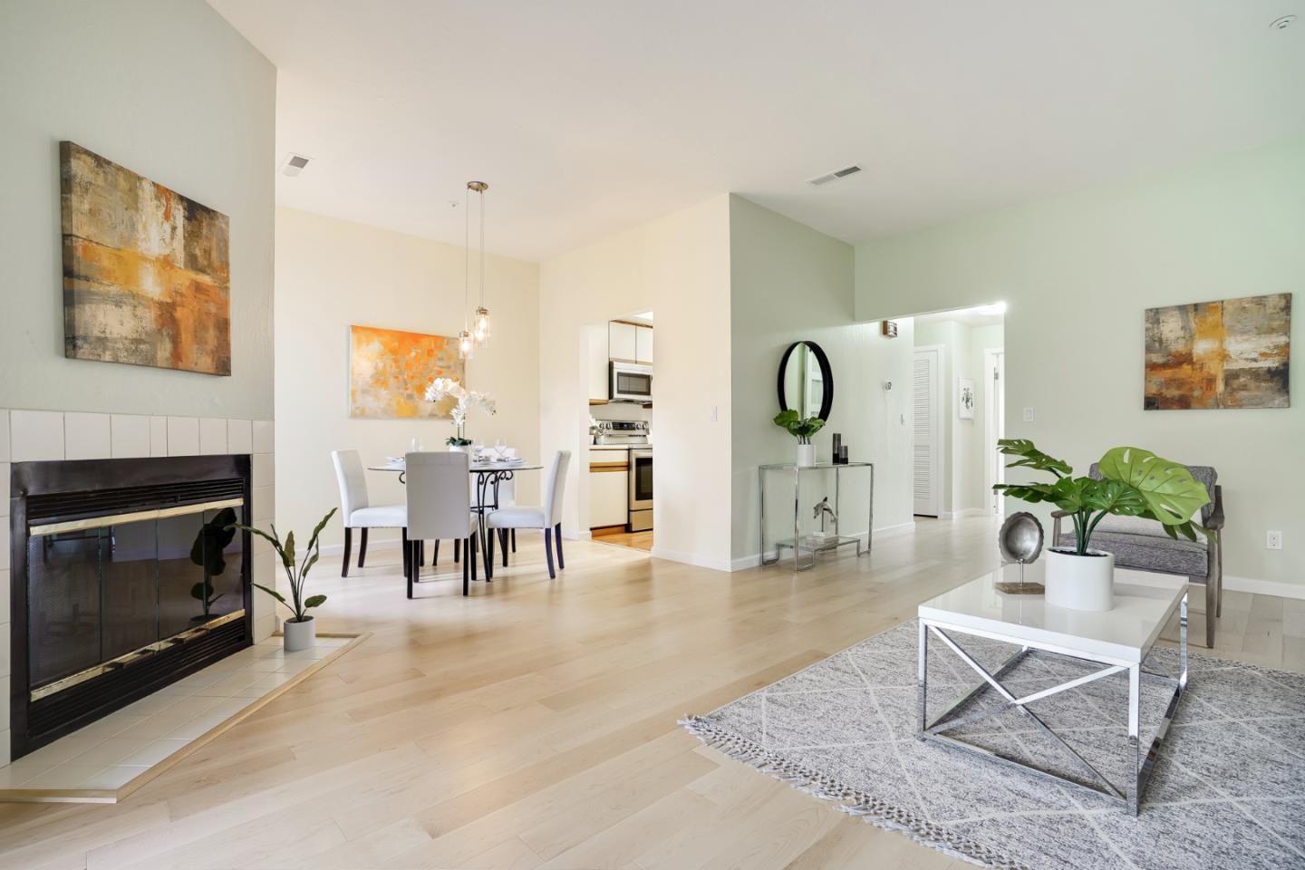 2601 Willowbrook Lane, Unit 9 Aptos, CA 95003 - Photo 18 of 29 a living room with furniture a dining table and a fireplace