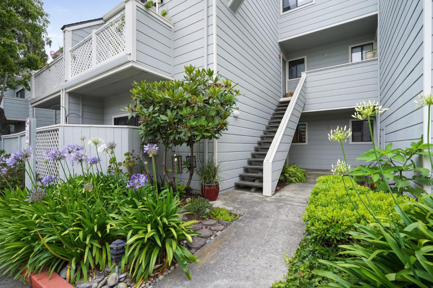 2601 Willowbrook Lane, Unit 9 Aptos, CA 95003 - Photo 2 of 29 a front view of a house with a yard
