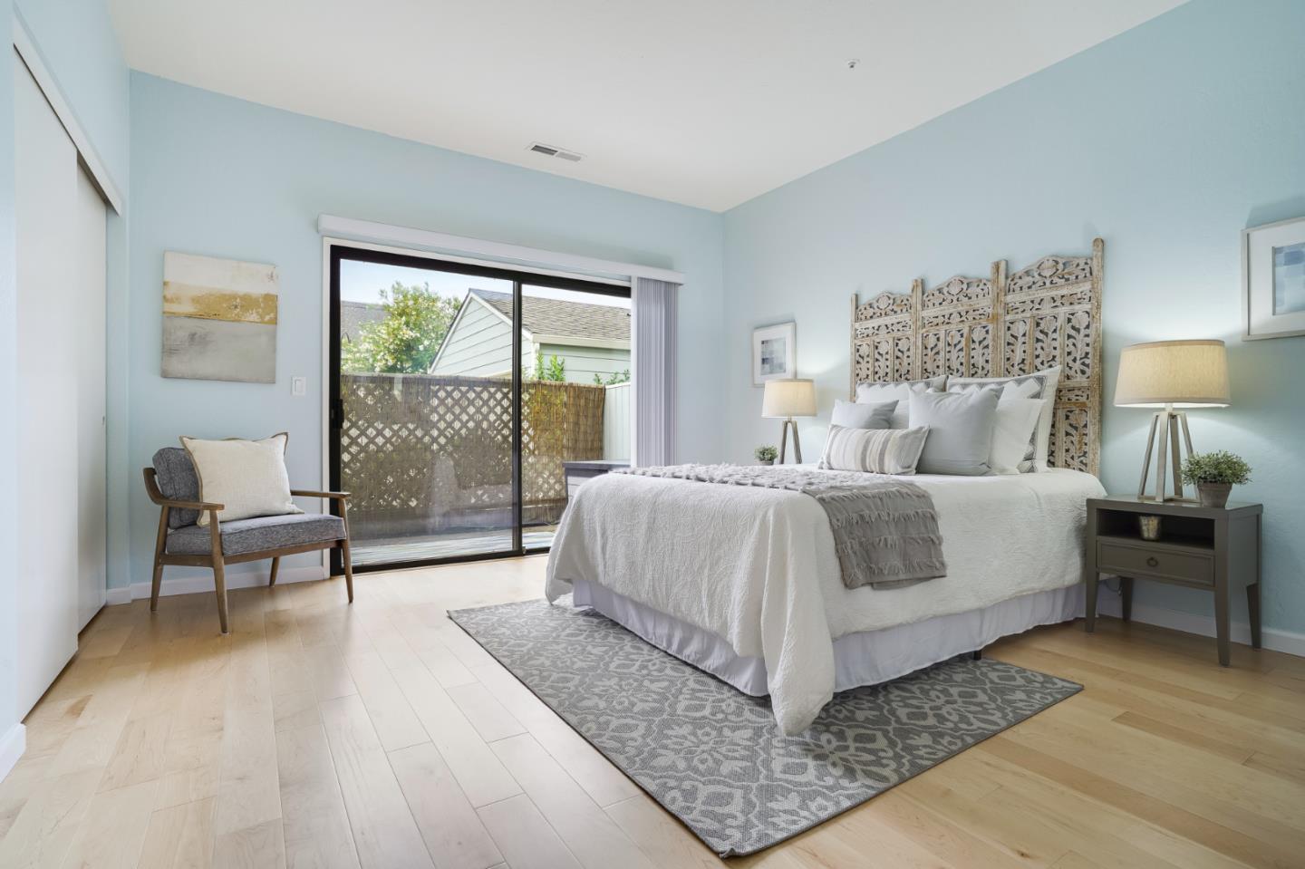 2601 Willowbrook Lane, Unit 9 Aptos, CA 95003 - Photo 22 of 29 a bedroom with bed and a large window