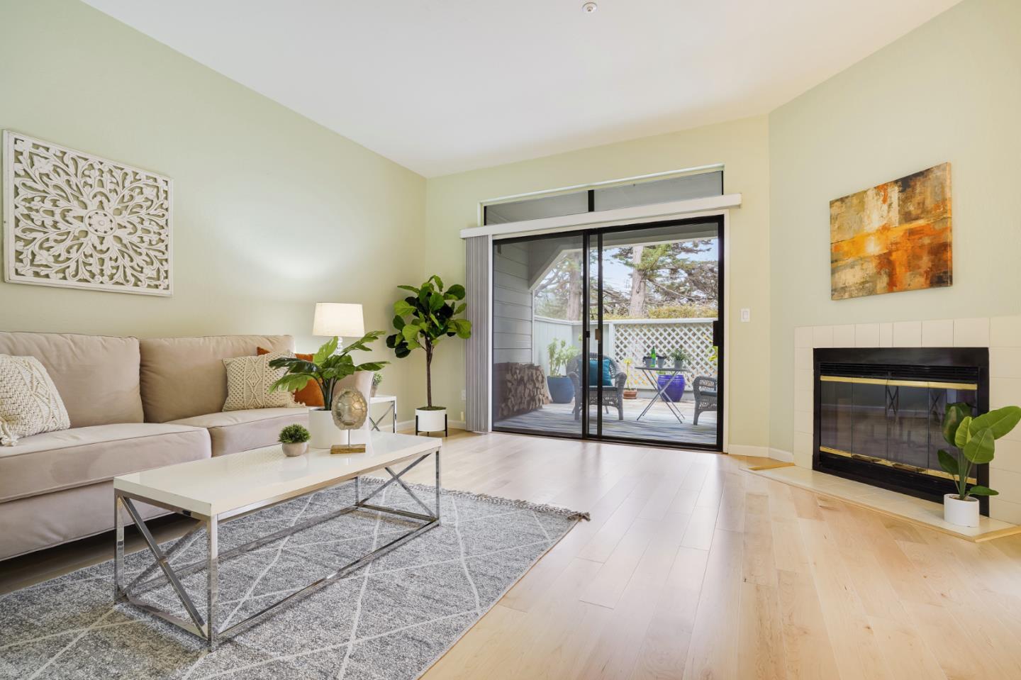 2601 Willowbrook Lane, Unit 9 Aptos, CA 95003 - Photo 4 of 29 a living room with furniture large window and a fireplace