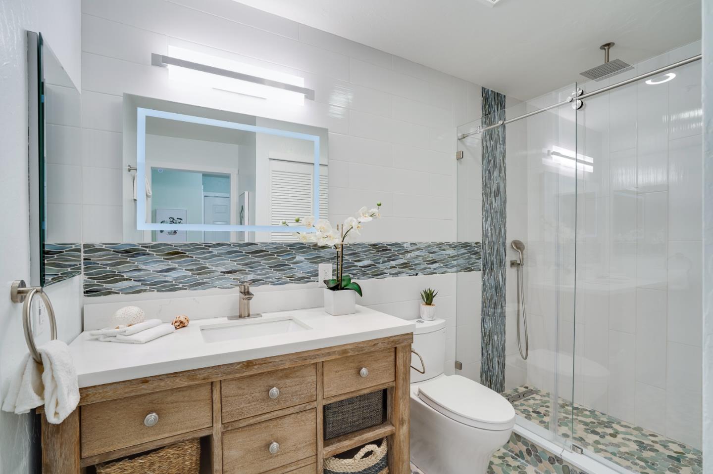 2601 Willowbrook Lane, Unit 9 Aptos, CA 95003 - Photo 9 of 29 a bathroom with a sink toilet and shower