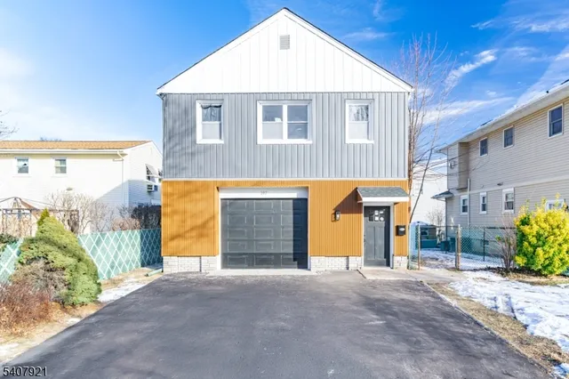 a view of a house with a garage