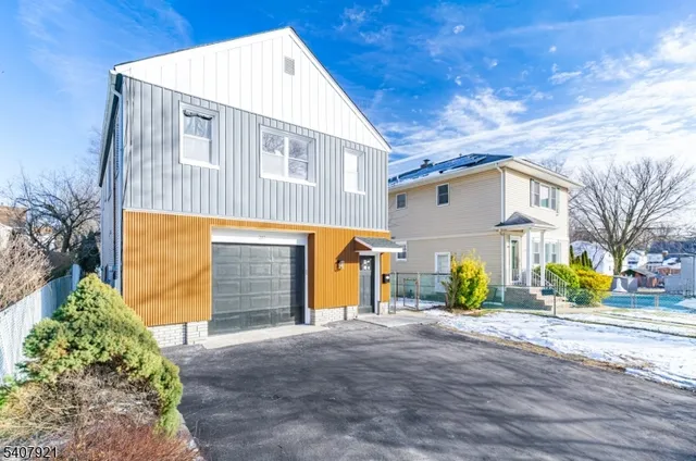 a front view of house with outdoor space