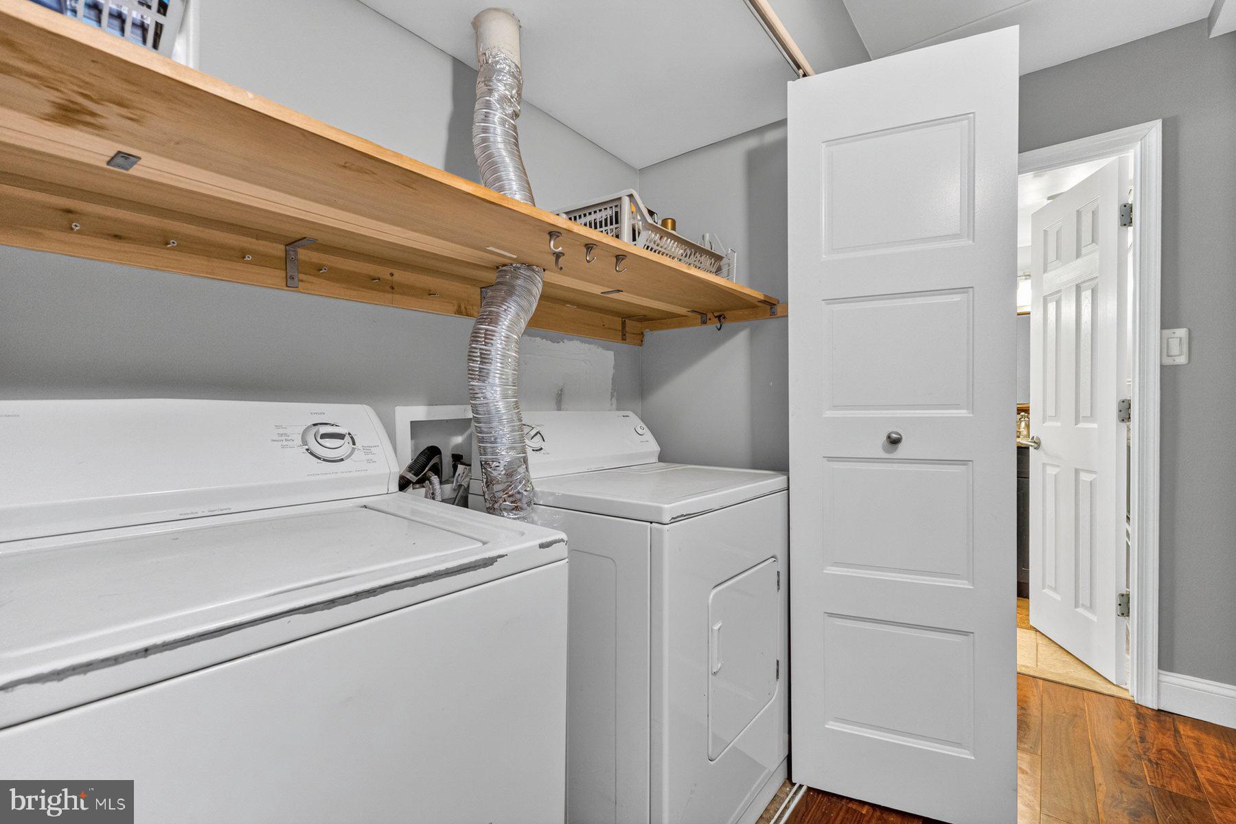 2330 Freetown Court, Unit 4/1B Reston, VA 20191 - Photo 19 of 26 Laundry in the hallway