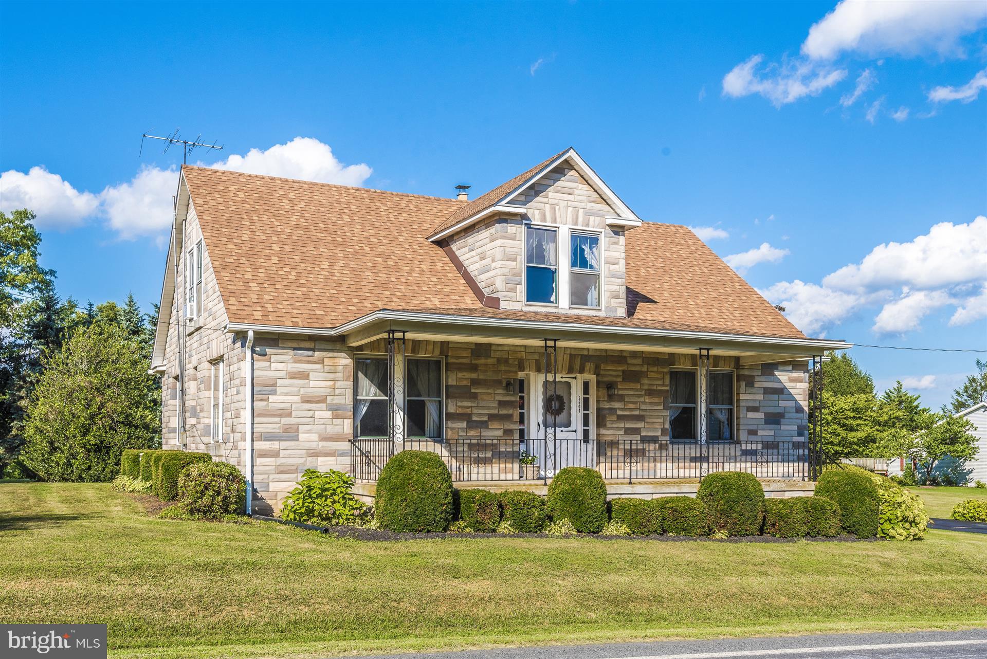 2601 Gillis Road Mount Airy, MD 21771 - Photo 1 of 29 a front view of a house with garden