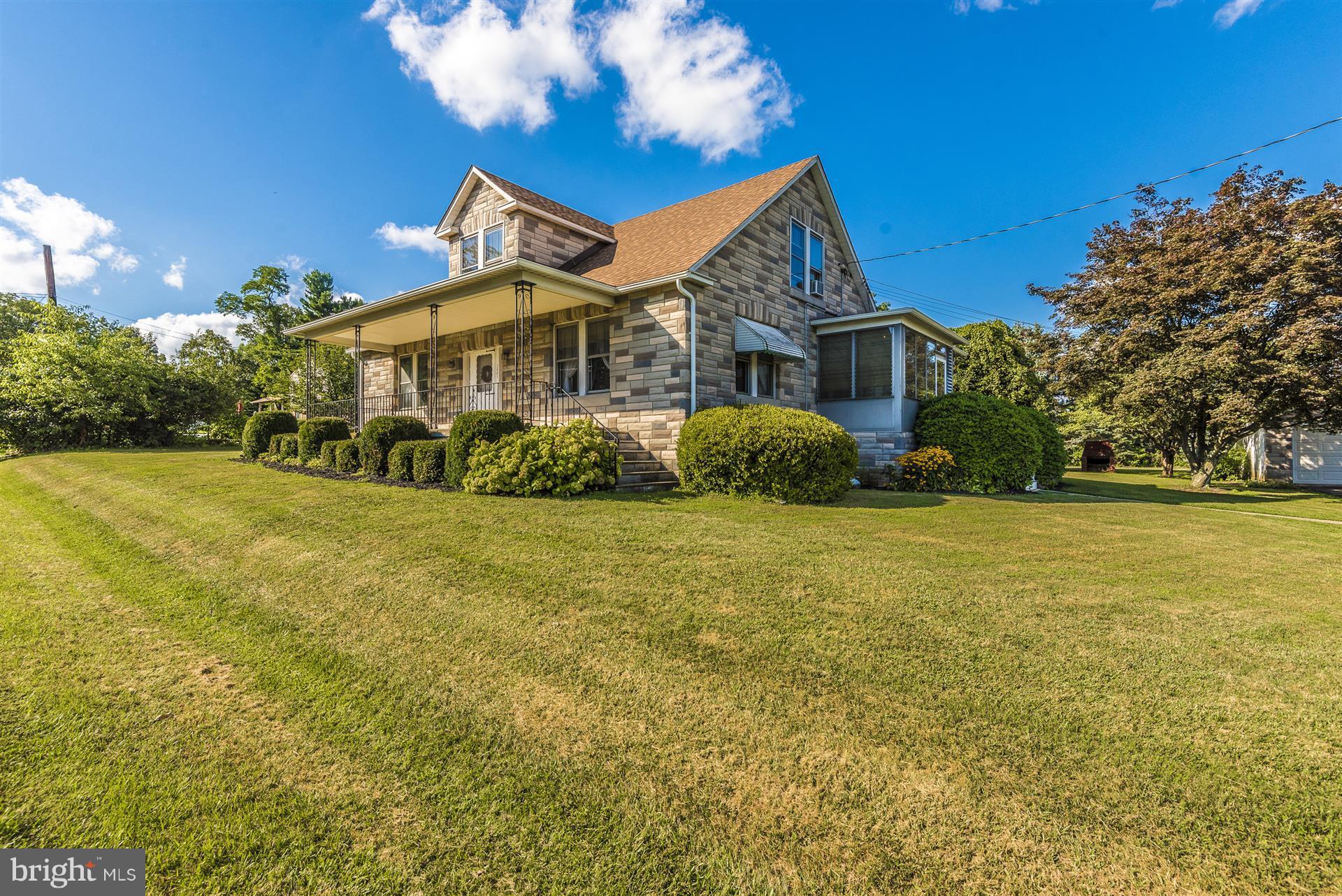 2601 Gillis Road Mount Airy, MD 21771 - Photo 2 of 29 a front view of a house with a yard