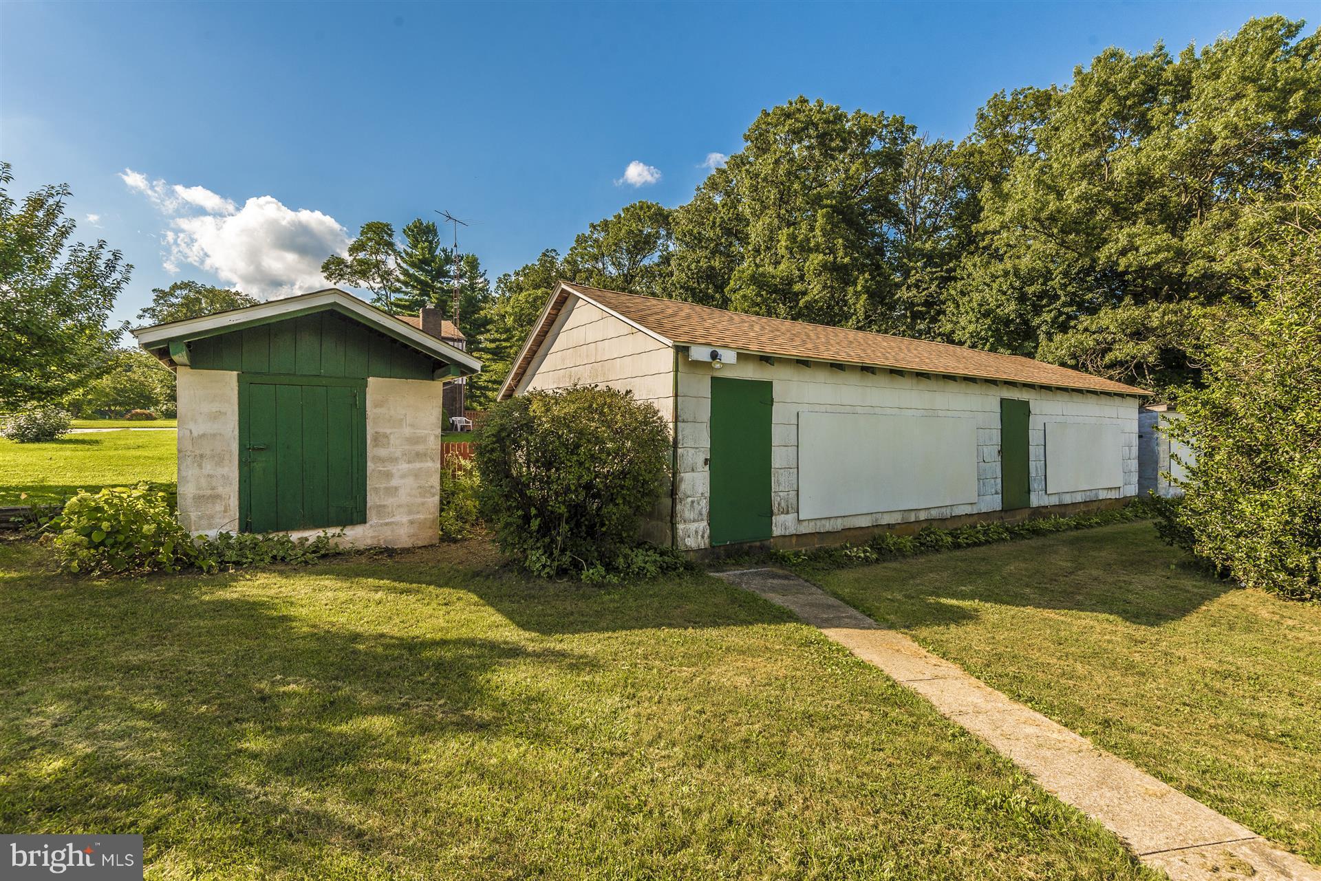 2601 Gillis Road Mount Airy, MD 21771 - Photo 27 of 29 a view of a house with a yard and garage