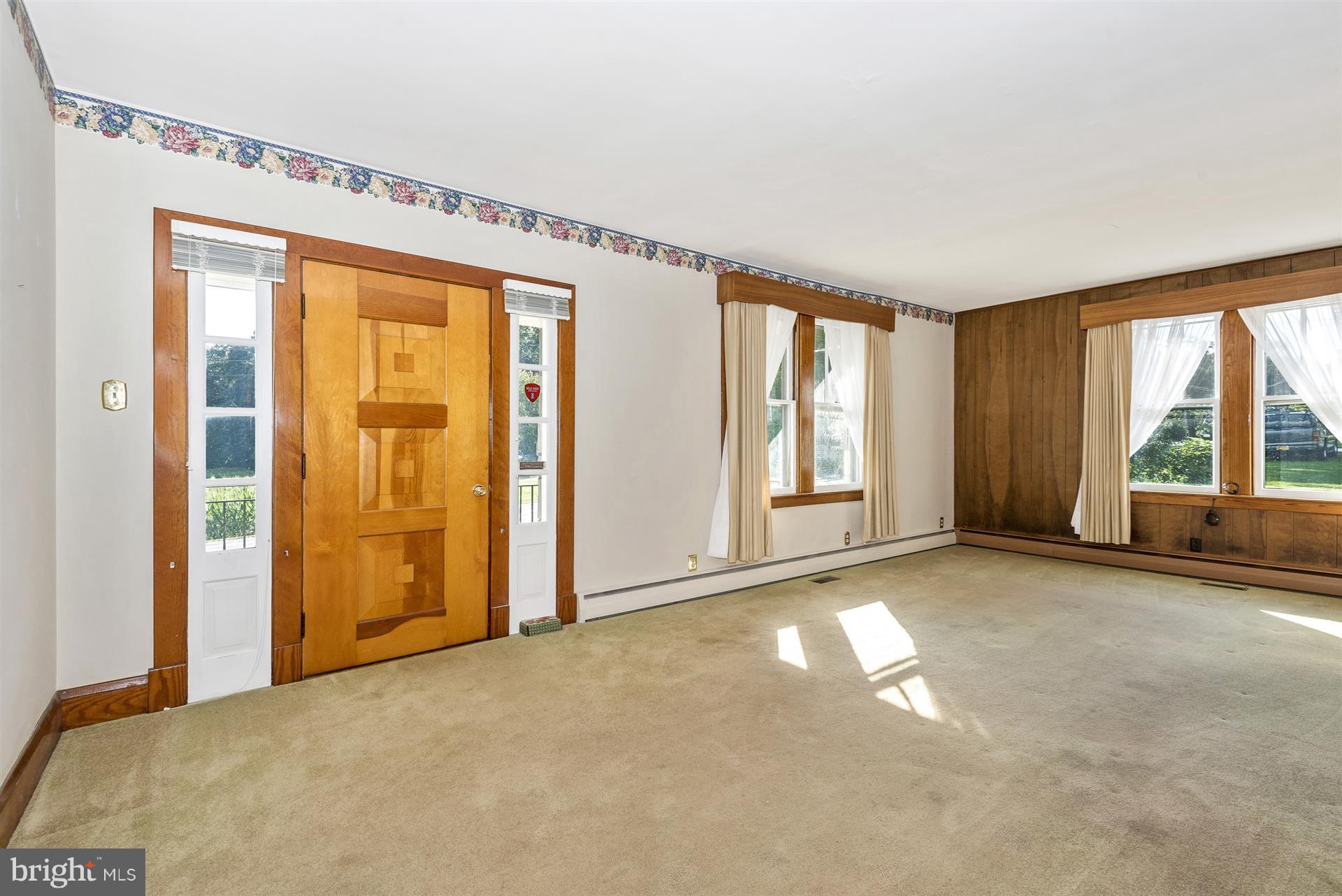 2601 Gillis Road Mount Airy, MD 21771 - Photo 6 of 29 a view of a room with large windows and couch