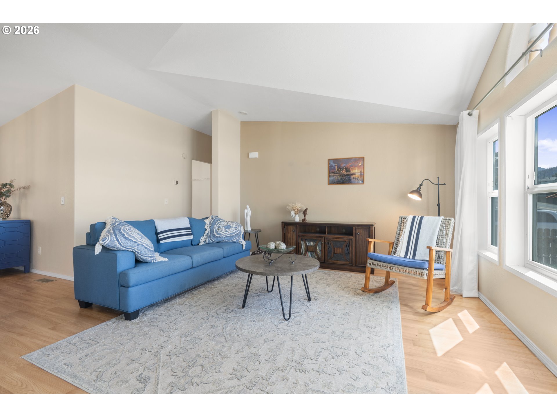 94033 Doyle Point Road Gold Beach, OR 97444 - Photo 19 of 42 a living room with furniture and wooden floor