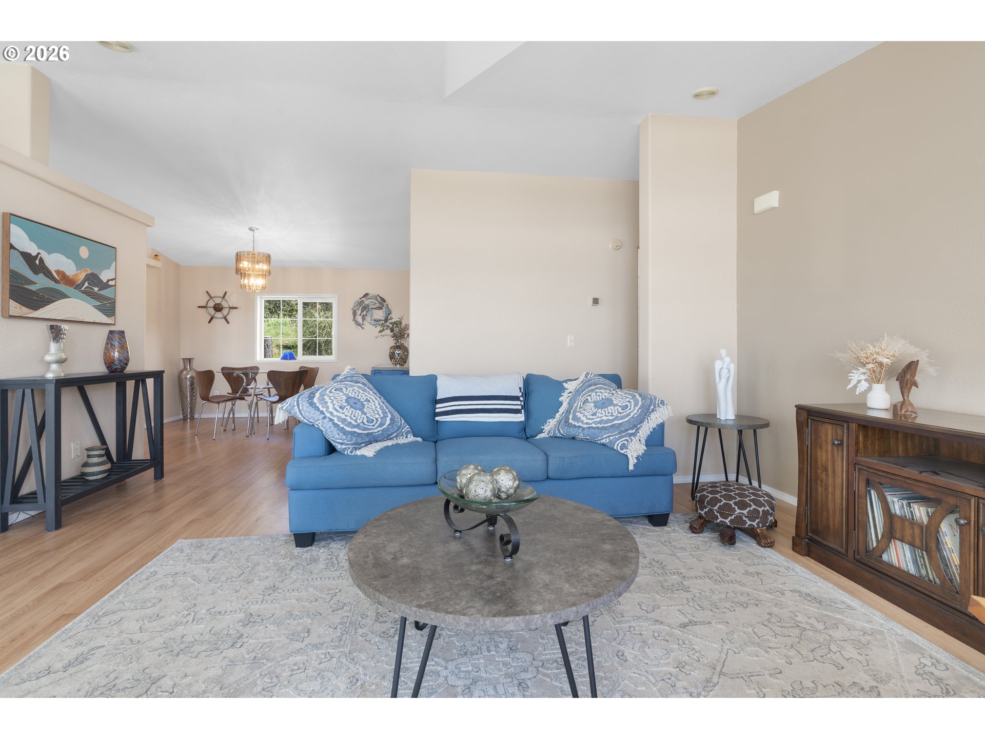 94033 Doyle Point Road Gold Beach, OR 97444 - Photo 20 of 42 a living room with furniture and a dining table