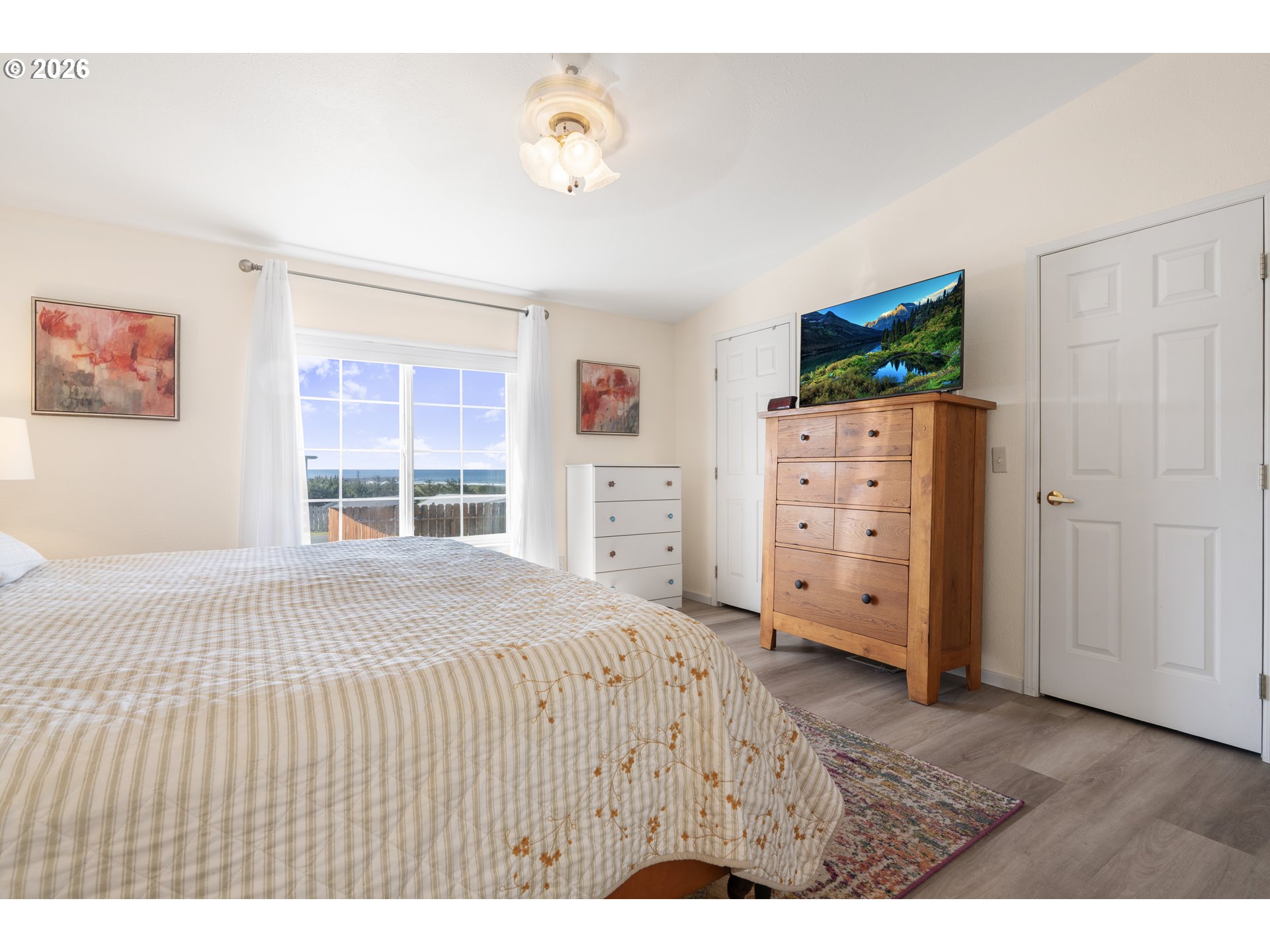 94033 Doyle Point Road Gold Beach, OR 97444 - Photo 22 of 42 a bedroom with a bed and a window