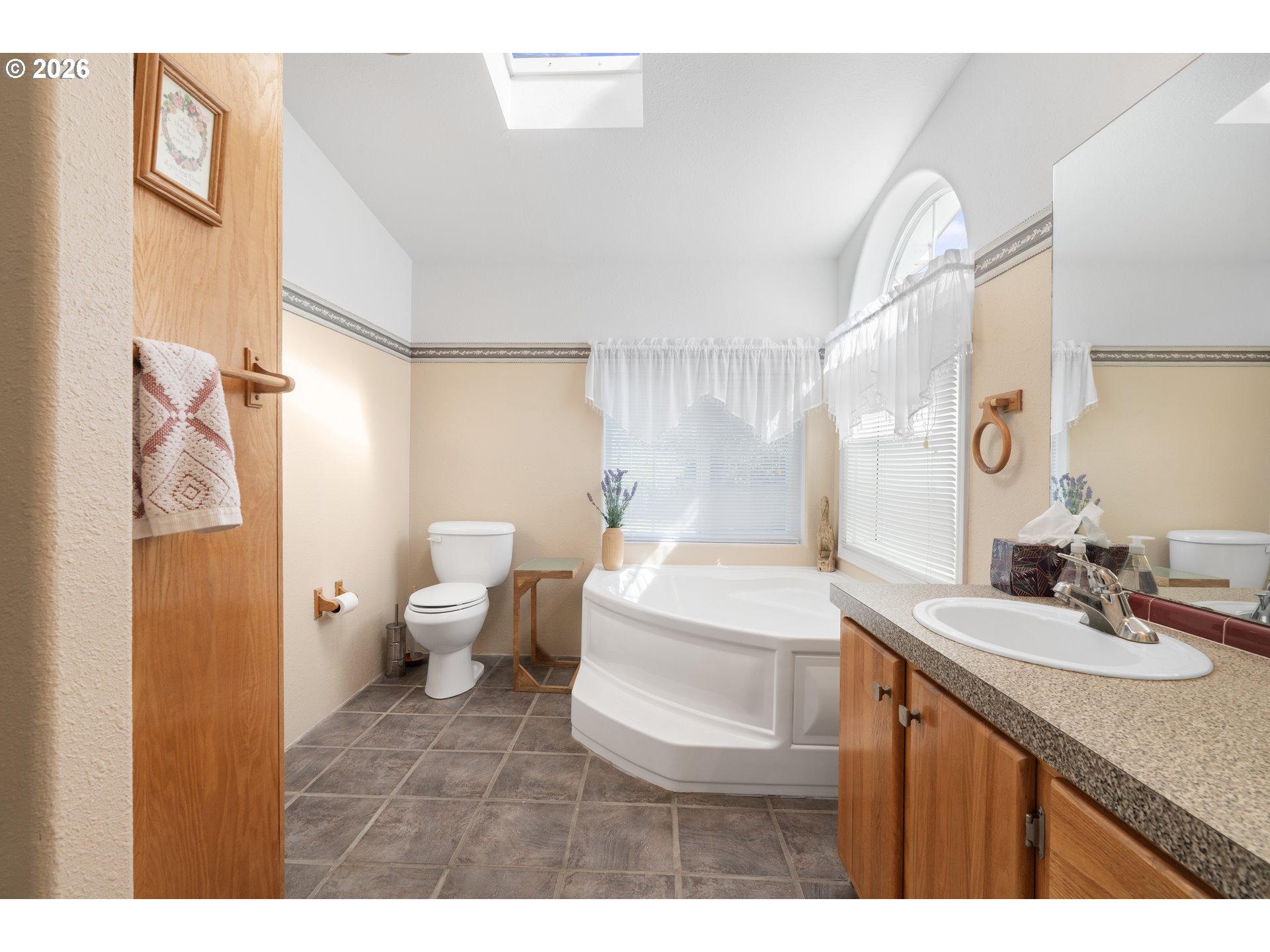 94033 Doyle Point Road Gold Beach, OR 97444 - Photo 26 of 42 a bathroom with a sink toilet vanity and shower