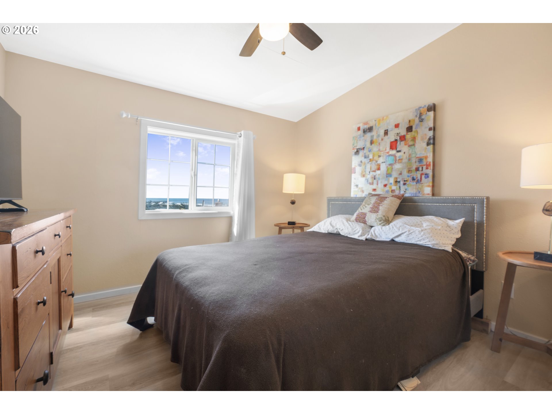 94033 Doyle Point Road Gold Beach, OR 97444 - Photo 28 of 42 a bedroom with a bed and a window