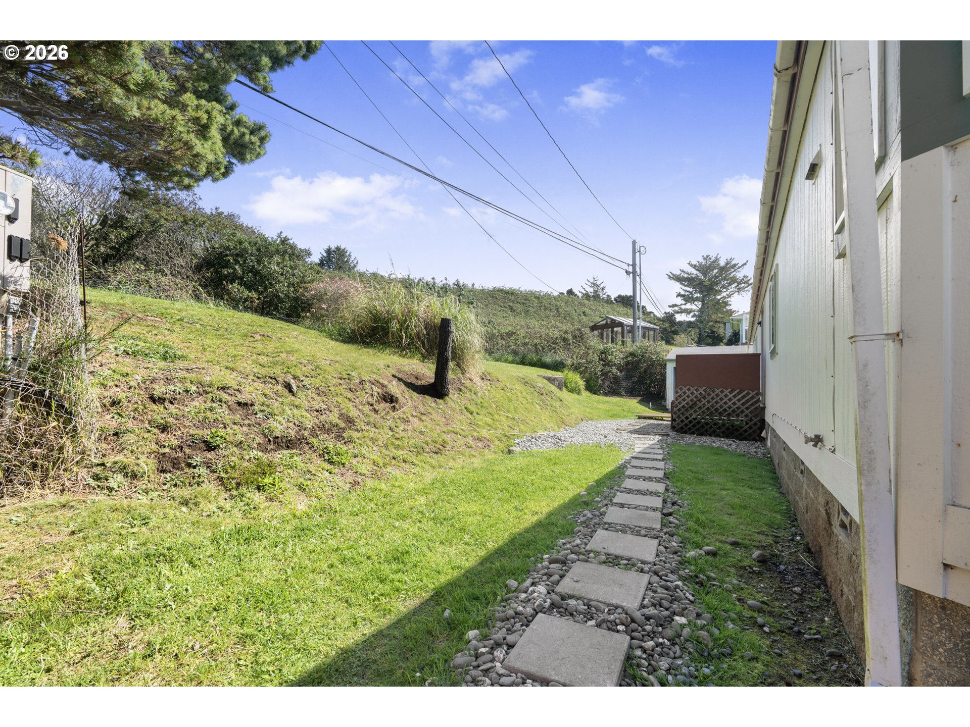 94033 Doyle Point Road Gold Beach, OR 97444 - Photo 35 of 42 a view of a backyard