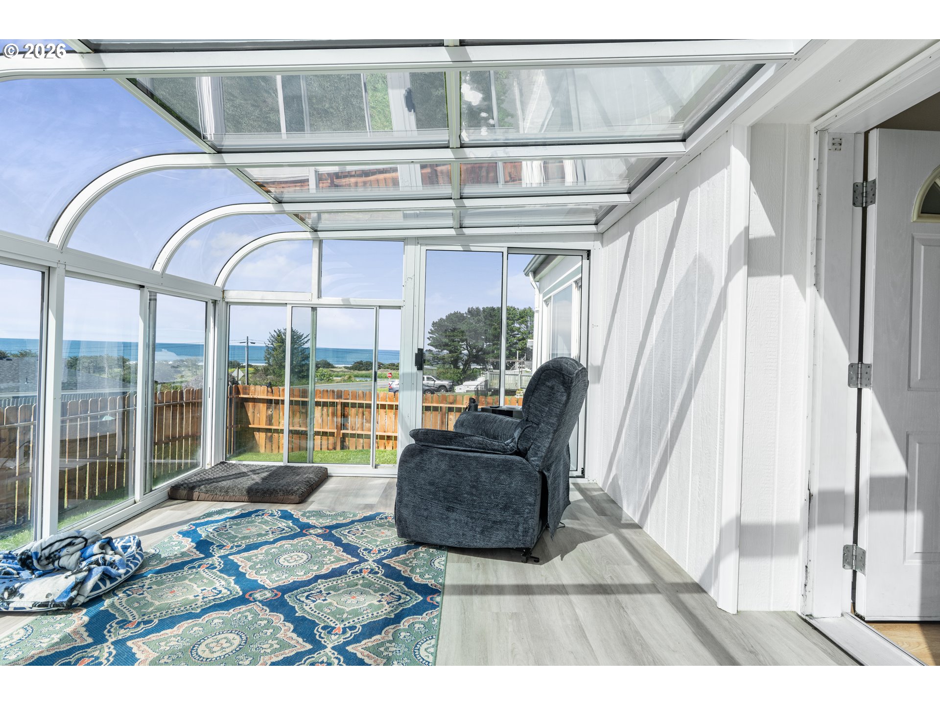 94033 Doyle Point Road Gold Beach, OR 97444 - Photo 4 of 42 a view of living room with furniture and floor to ceiling window