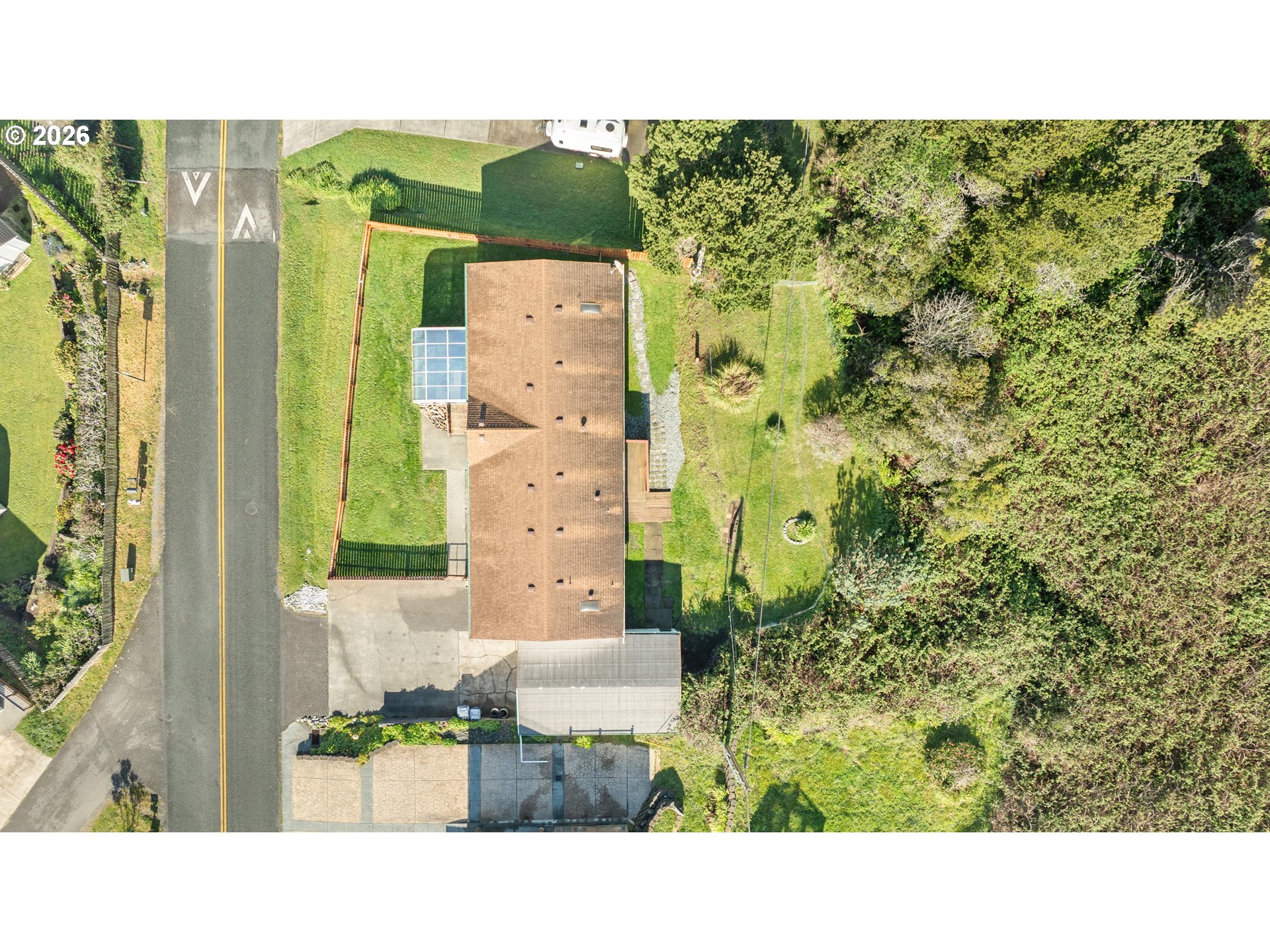 94033 Doyle Point Road Gold Beach, OR 97444 - Photo 42 of 42 a picture of a bathroom with a sink and a mirror