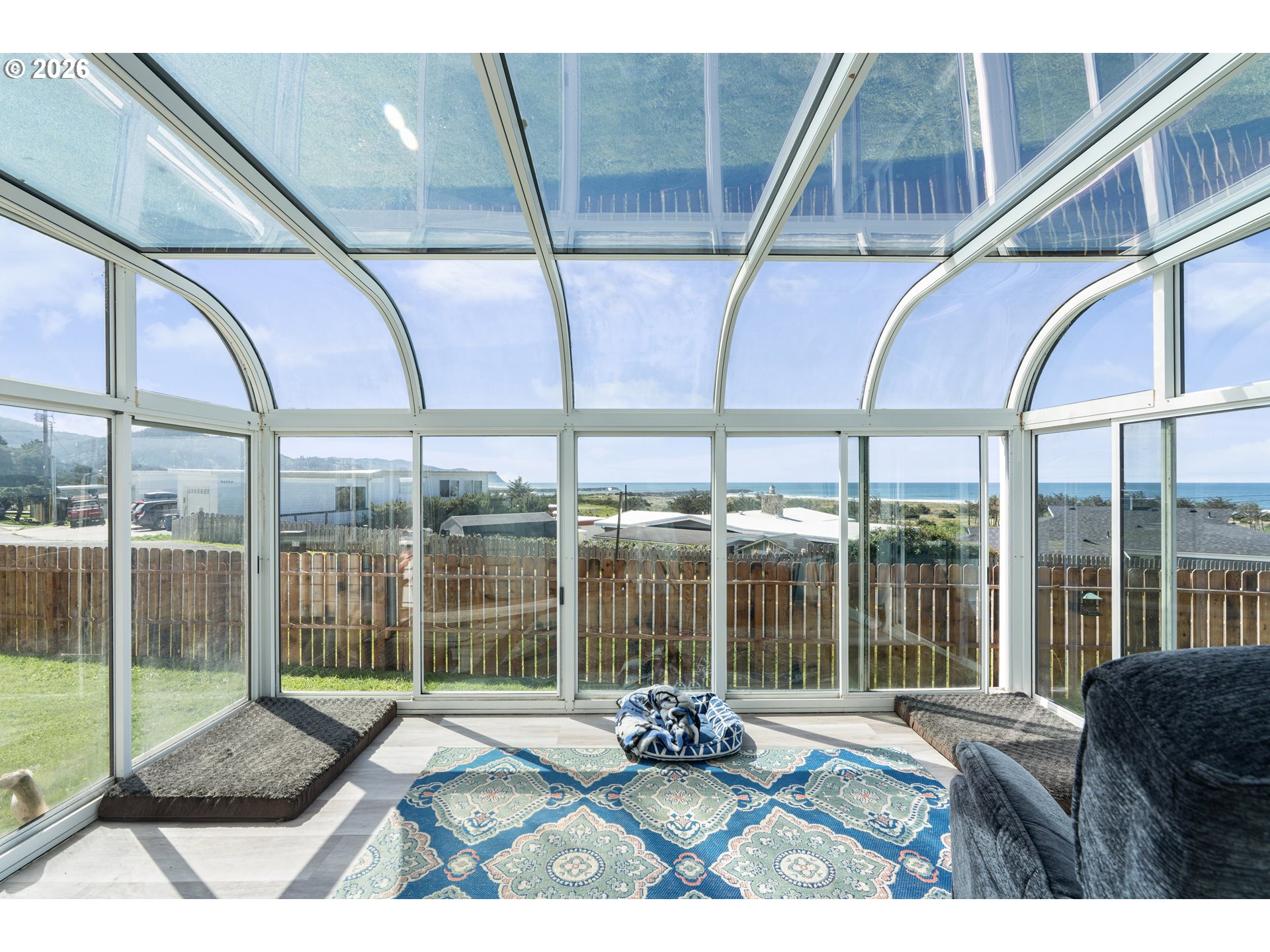 94033 Doyle Point Road Gold Beach, OR 97444 - Photo 5 of 42 a house with garden in front of it