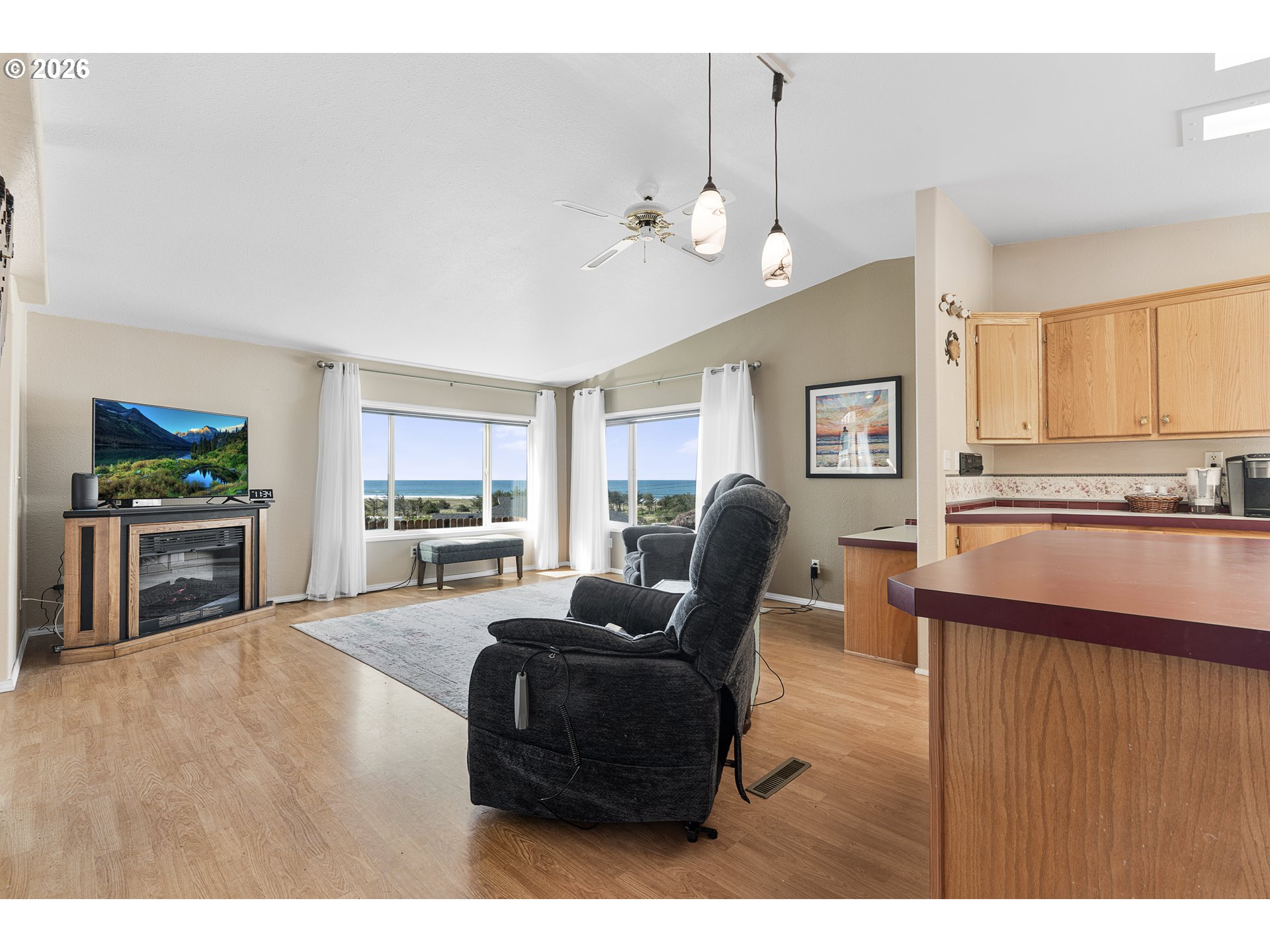 94033 Doyle Point Road Gold Beach, OR 97444 - Photo 9 of 42 a living room with furniture and kitchen area