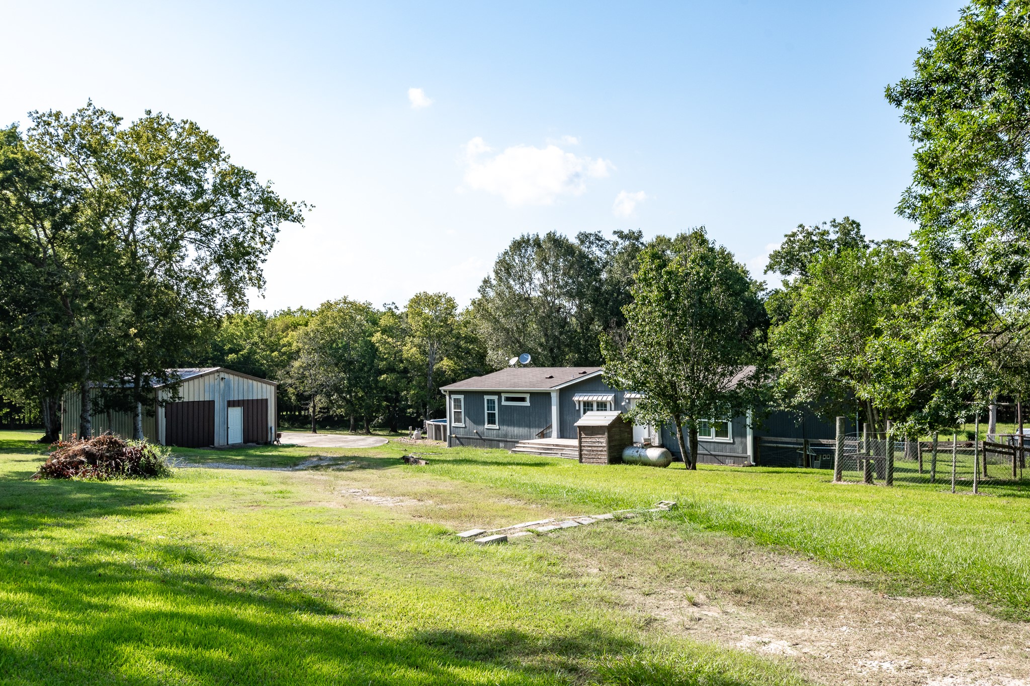 1713 Fm 2797 Dayton, TX 77535 - Photo 1 of 50 a house view with swimming pool in front of it