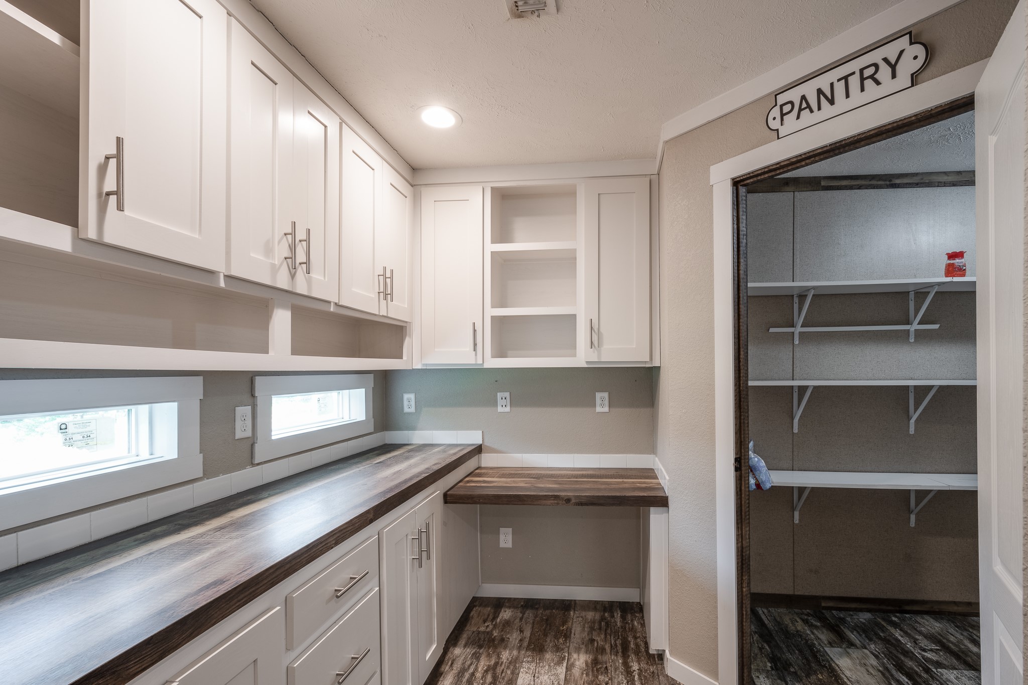 1713 Fm 2797 Dayton, TX 77535 - Photo 15 of 50 a kitchen with a sink and cabinets