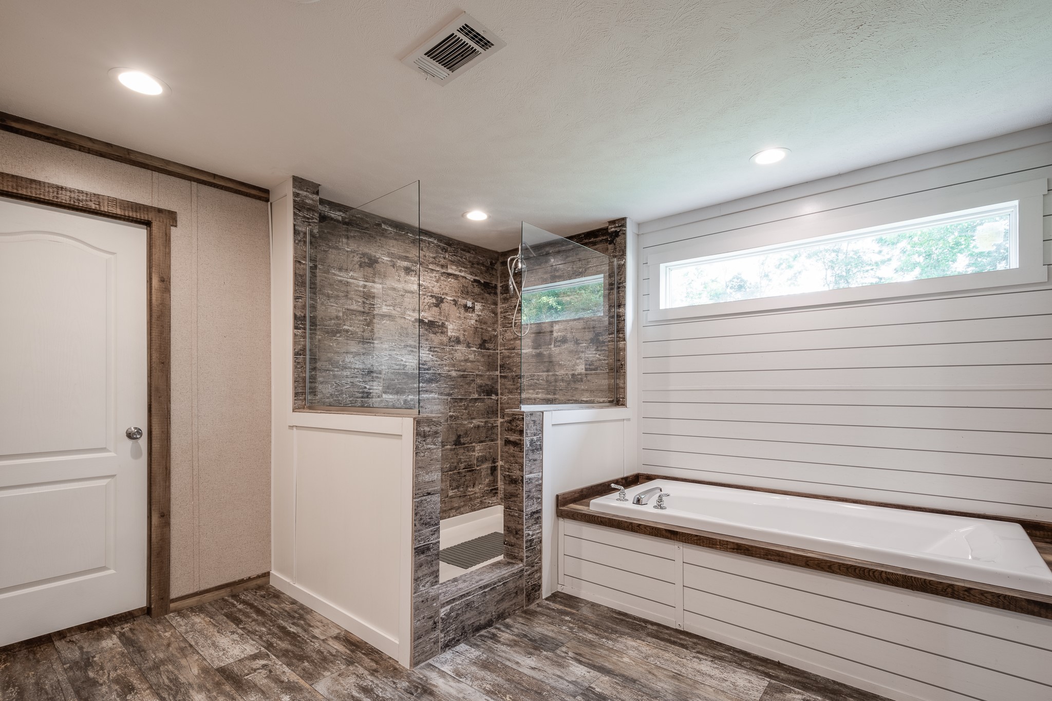 1713 Fm 2797 Dayton, TX 77535 - Photo 19 of 50 a bathroom with a bathtub and shower