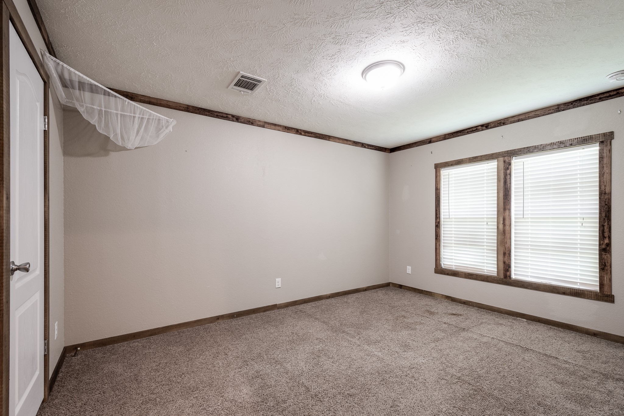 1713 Fm 2797 Dayton, TX 77535 - Photo 23 of 50 a view of an empty room with a window