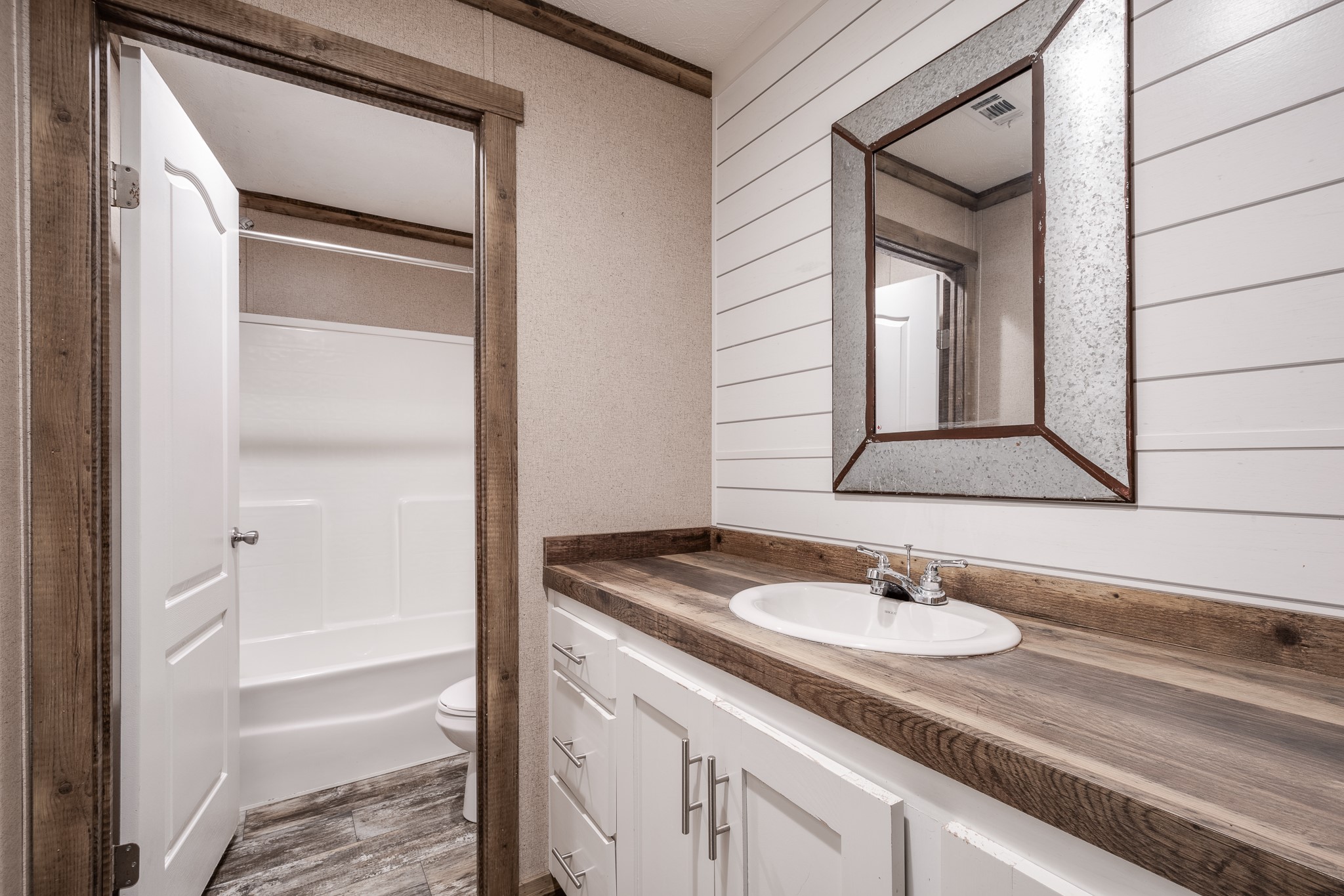 1713 Fm 2797 Dayton, TX 77535 - Photo 24 of 50 a bathroom with a sink and a mirror