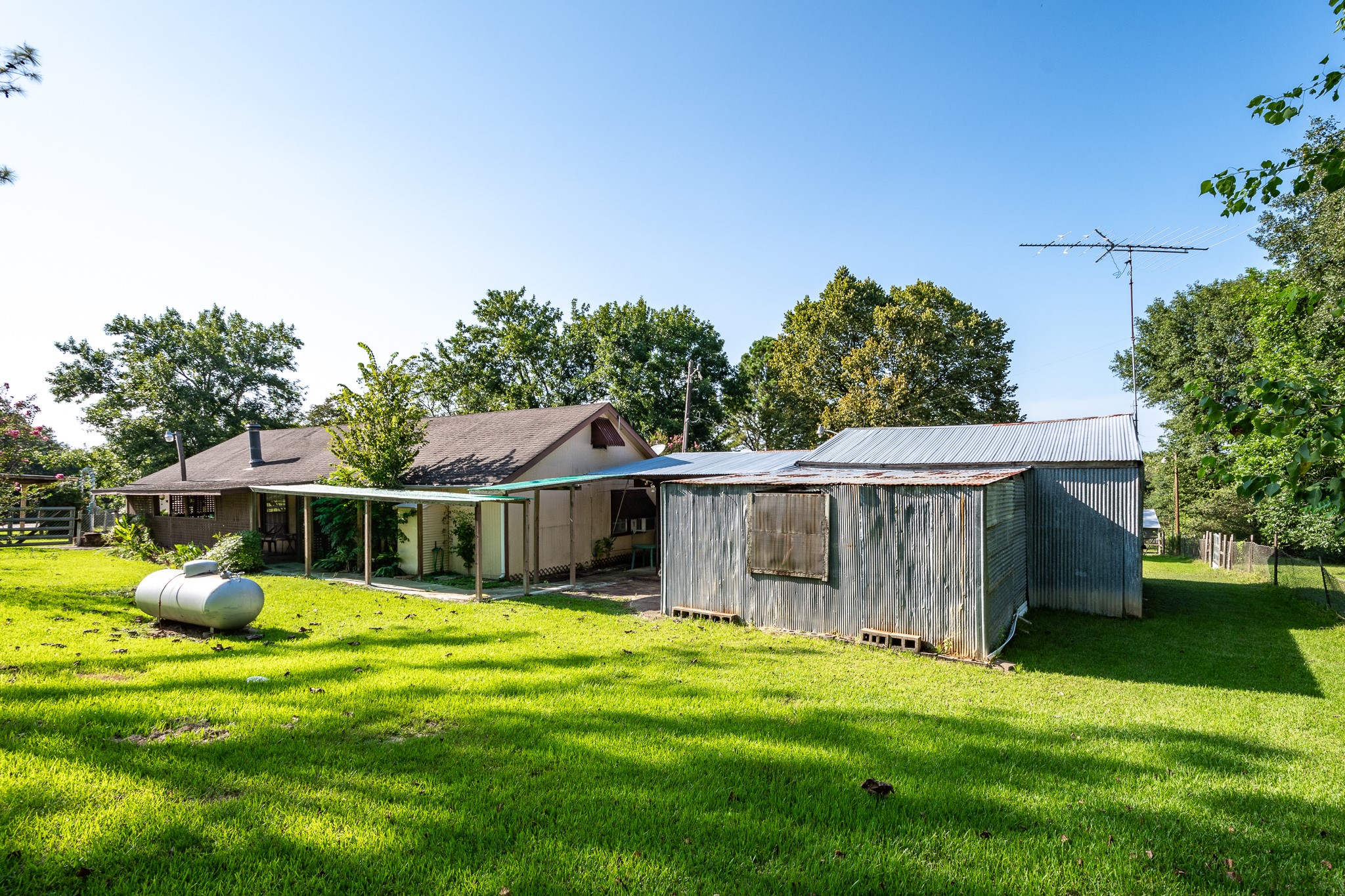 1713 Fm 2797 Dayton, TX 77535 - Photo 32 of 50 a view of a house with a big yard