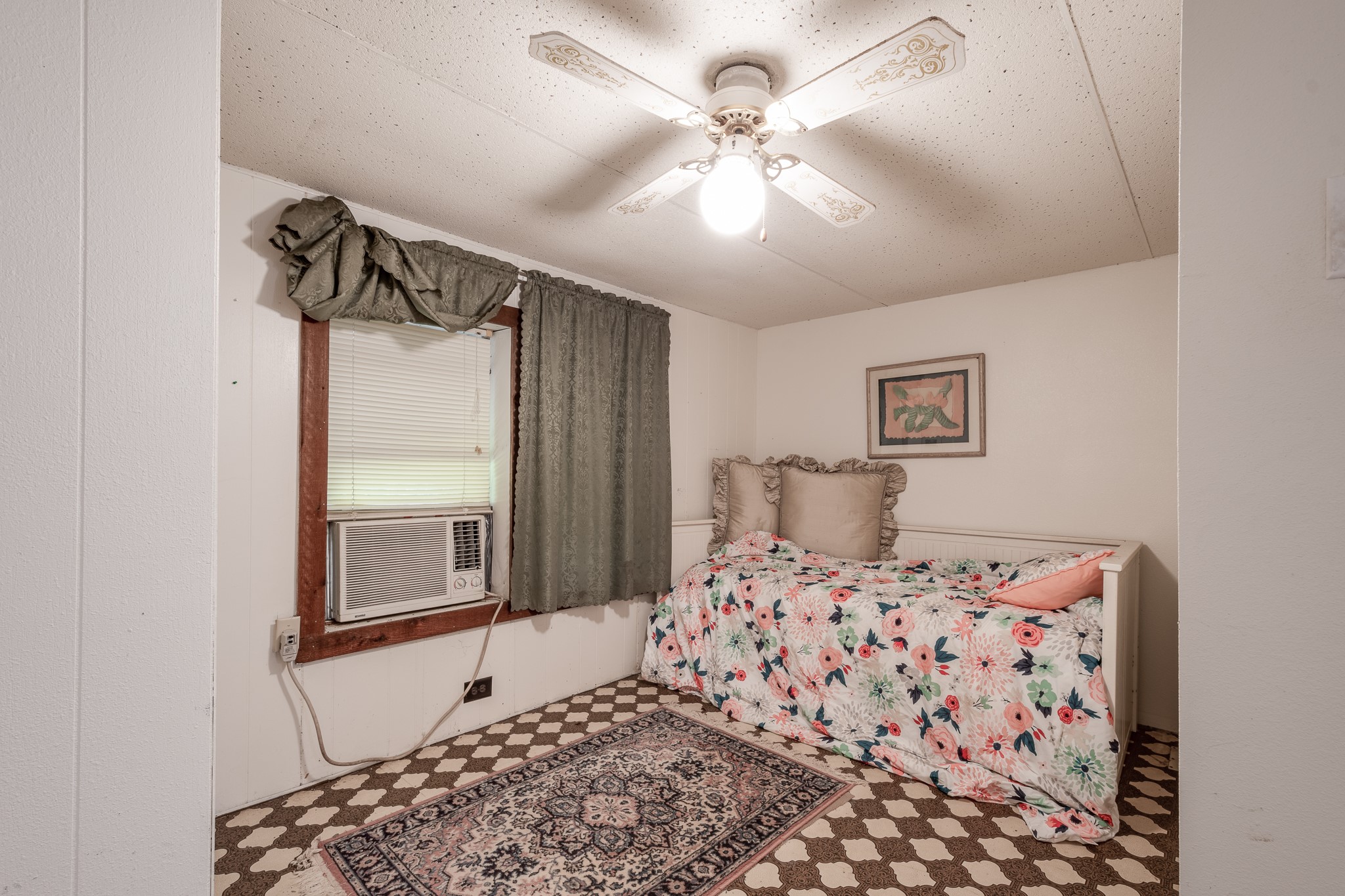 1713 Fm 2797 Dayton, TX 77535 - Photo 41 of 50 a bedroom with a large bed and a chandelier