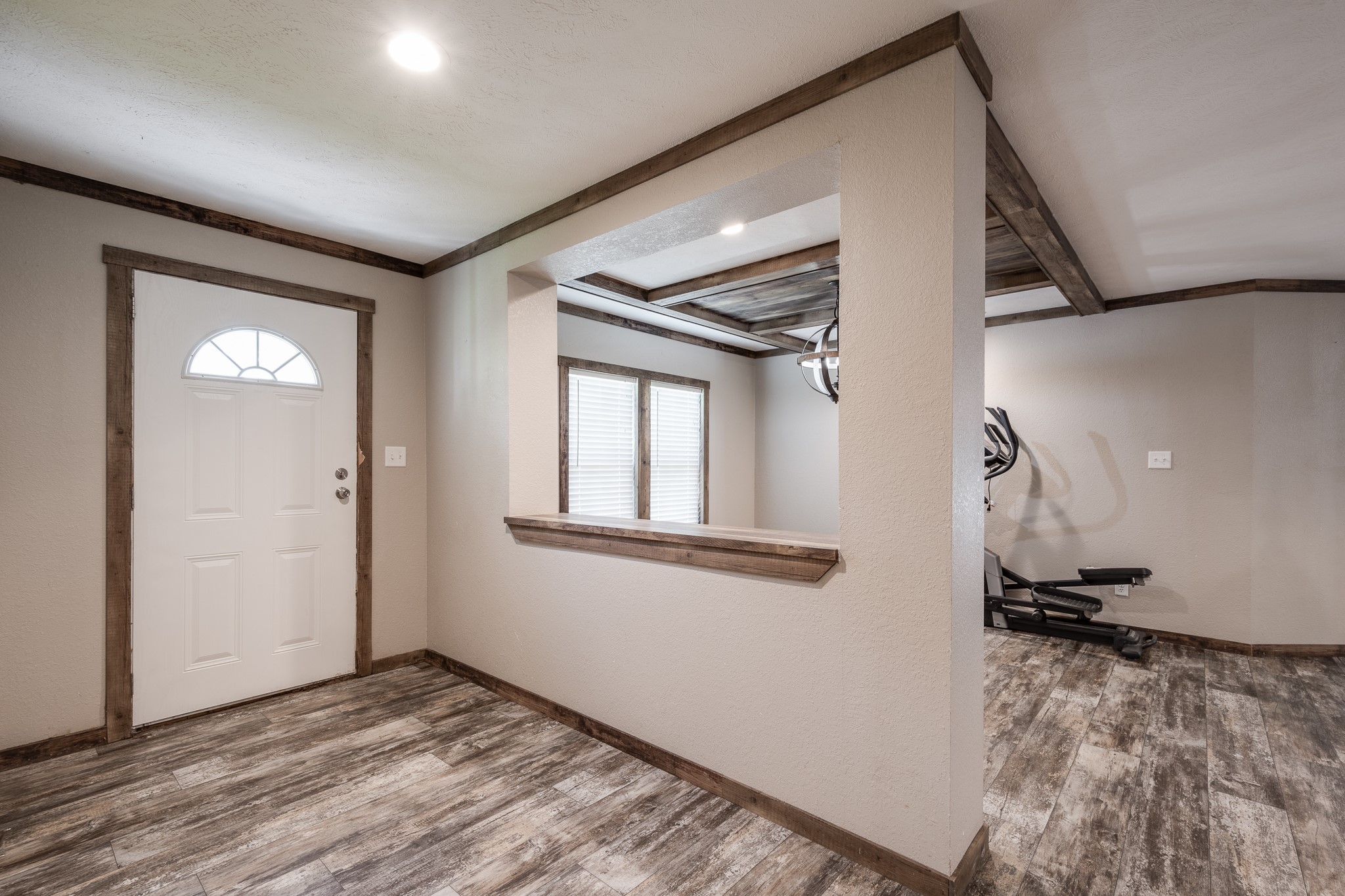 1713 Fm 2797 Dayton, TX 77535 - Photo 8 of 50 a view of a livingroom with wooden floor and a ceiling fan
