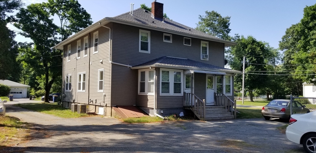 403 South Main Street, Unit 1 Sharon, MA 02067 - Photo 2 of 16 a view of a house with a patio