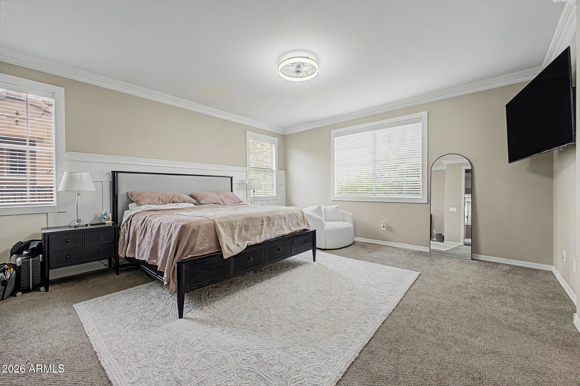 15918 South 11th Way Phoenix, AZ 85048 - Photo 11 of 32 a bedroom with a bed and a flat screen tv