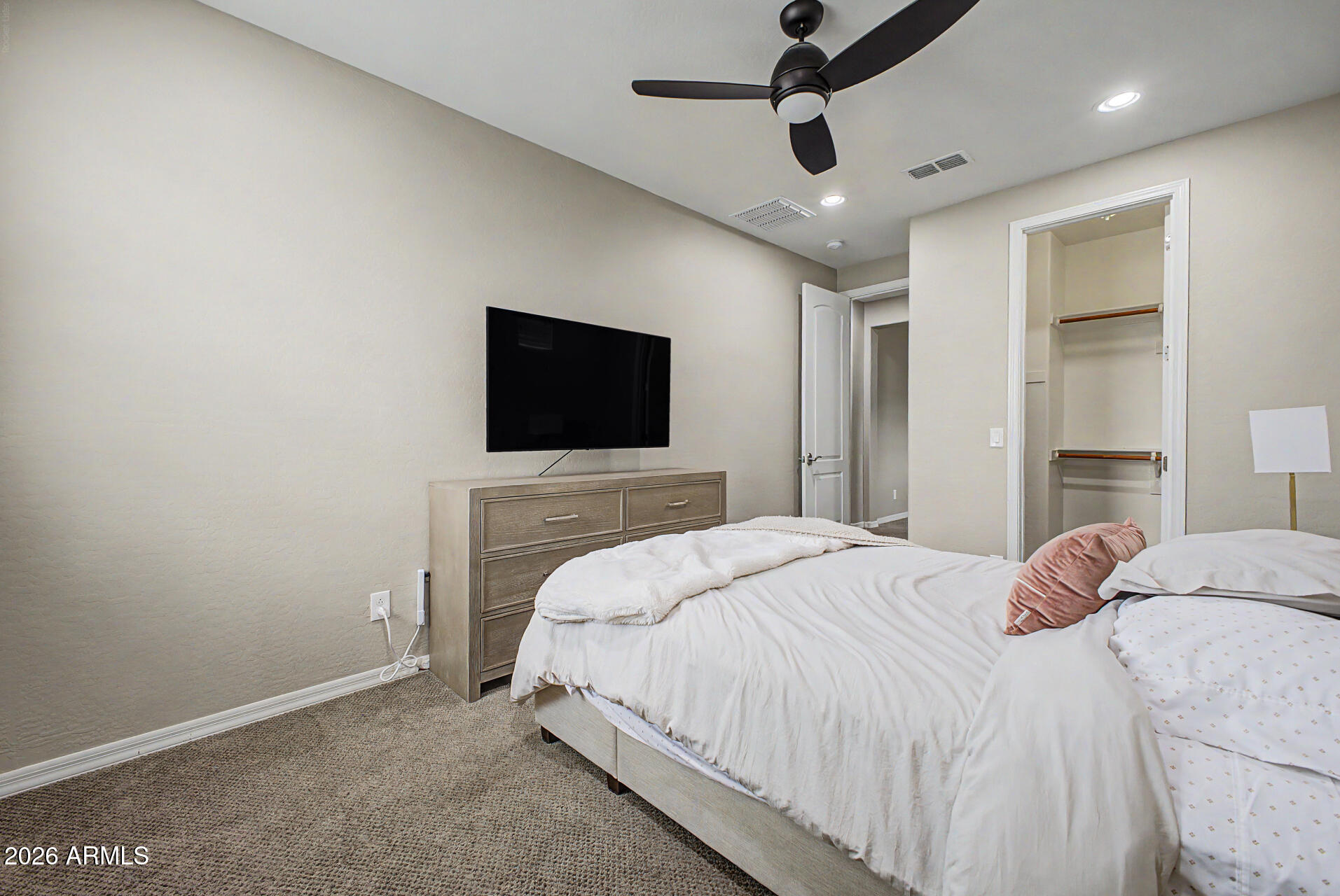 15918 South 11th Way Phoenix, AZ 85048 - Photo 17 of 32 a bedroom with a bed and a flat screen tv