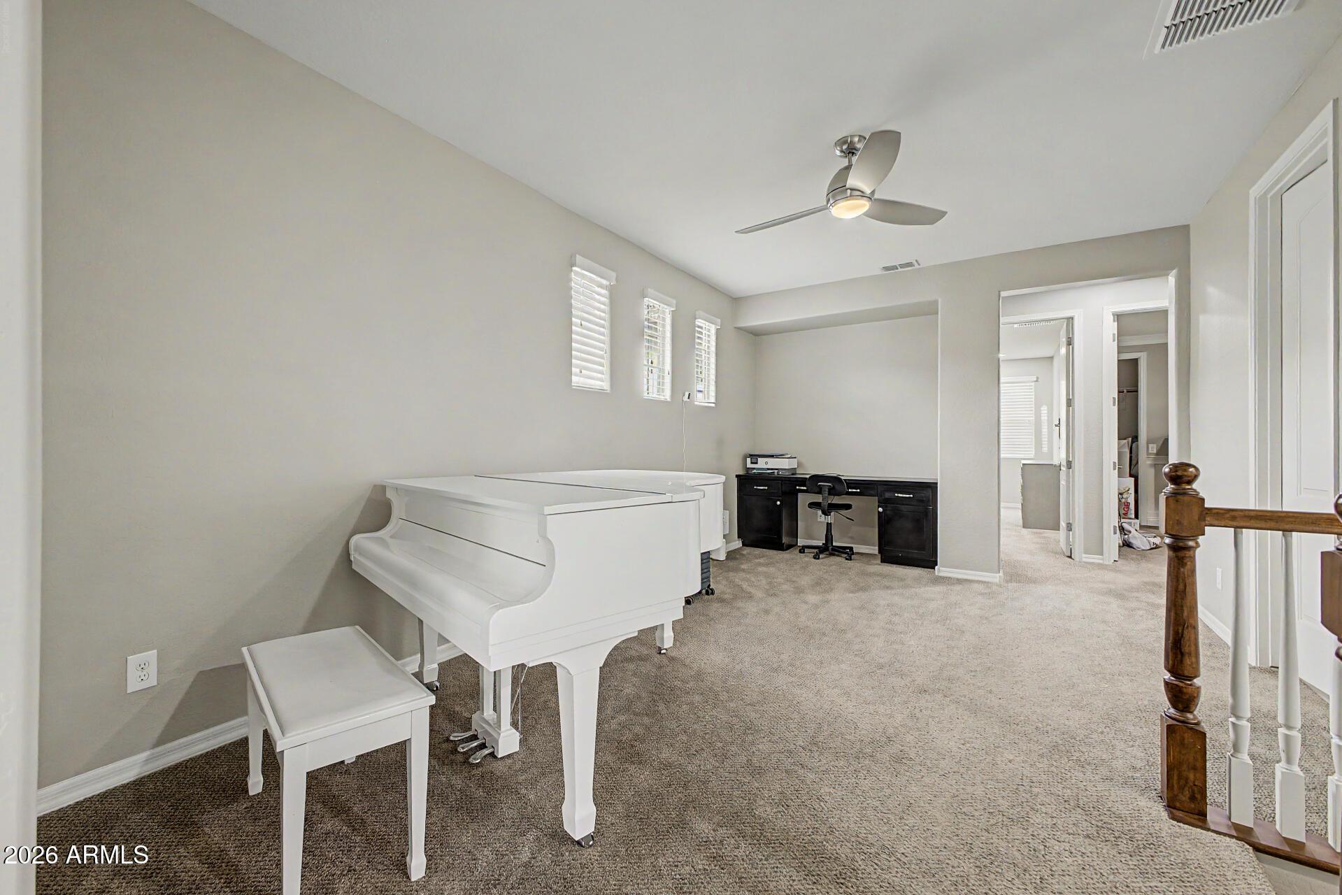 15918 South 11th Way Phoenix, AZ 85048 - Photo 24 of 32 a room with furniture and a ceiling fan