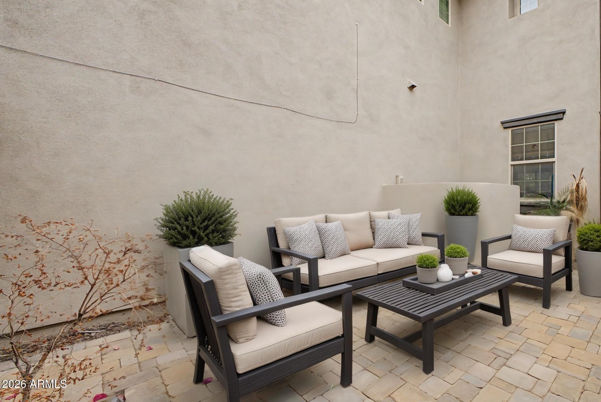 15918 South 11th Way Phoenix, AZ 85048 - Photo 28 of 32 a living room with furniture and wooden floor