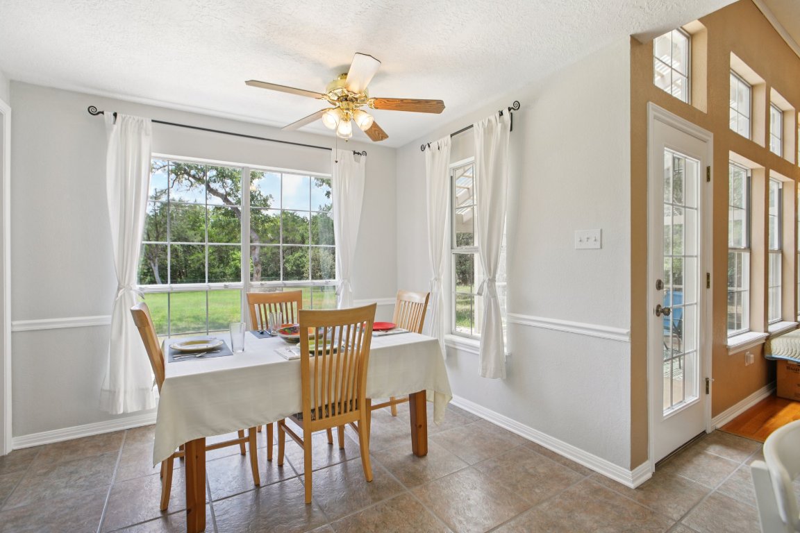148 Oak Ridge Drive Cedar Creek, TX 78612 - Photo 14 of 40 a view of a dining room with furniture window and outside view