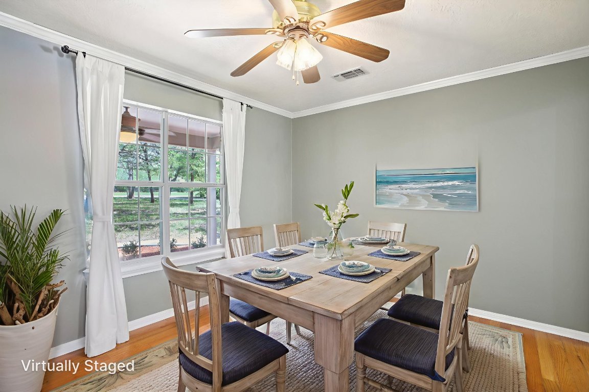 148 Oak Ridge Drive Cedar Creek, TX 78612 - Photo 18 of 40 a view of a dining room with furniture window and outside view