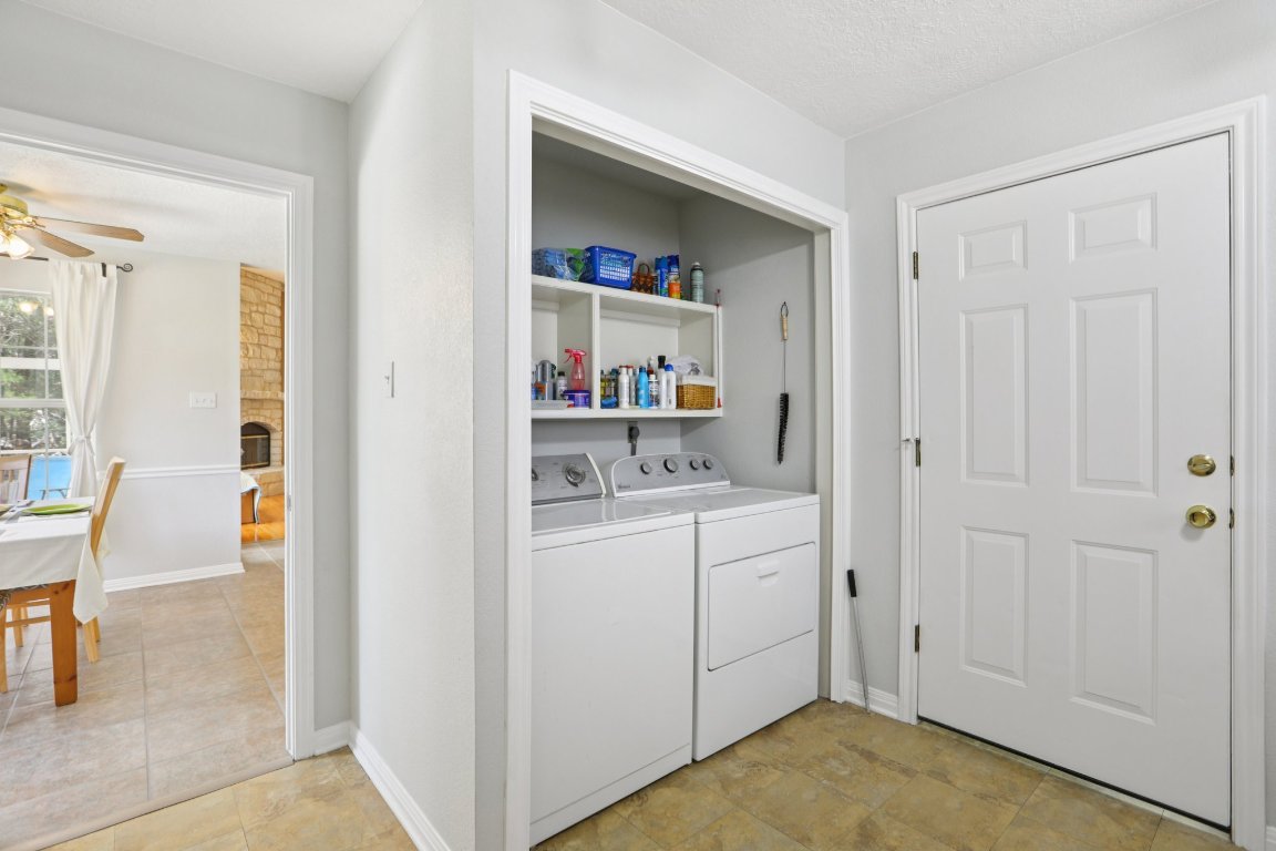 148 Oak Ridge Drive Cedar Creek, TX 78612 - Photo 24 of 40 a view of kitchen and utility room