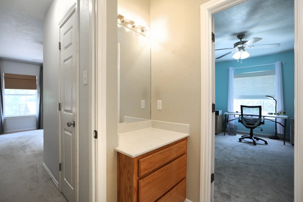 148 Oak Ridge Drive Cedar Creek, TX 78612 - Photo 32 of 40 a view of a bathroom from the hallway