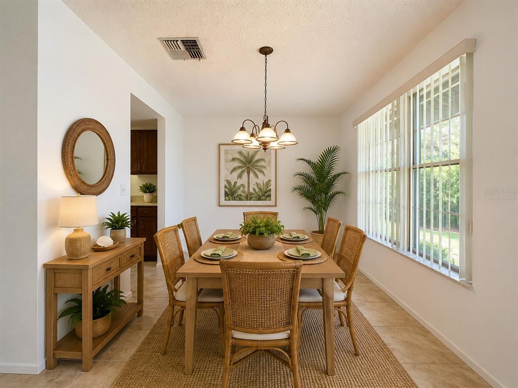 9319 Trowbridge Court New Port Richey, FL 34655 - Photo 25 of 78 a dining room with furniture window wooden floor