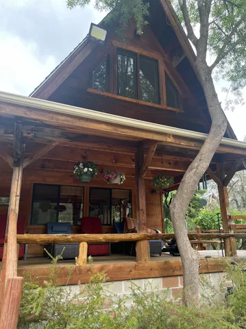 a view of a building with sitting area