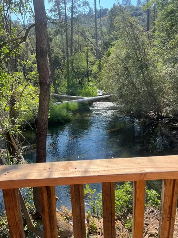 a view of swimming pool from a balcony