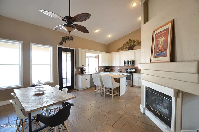 a view of a dining room with furniture