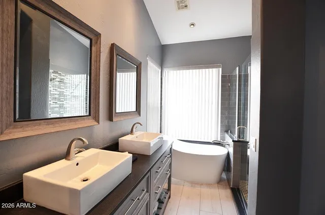 a bathroom with a sink and a bathtub