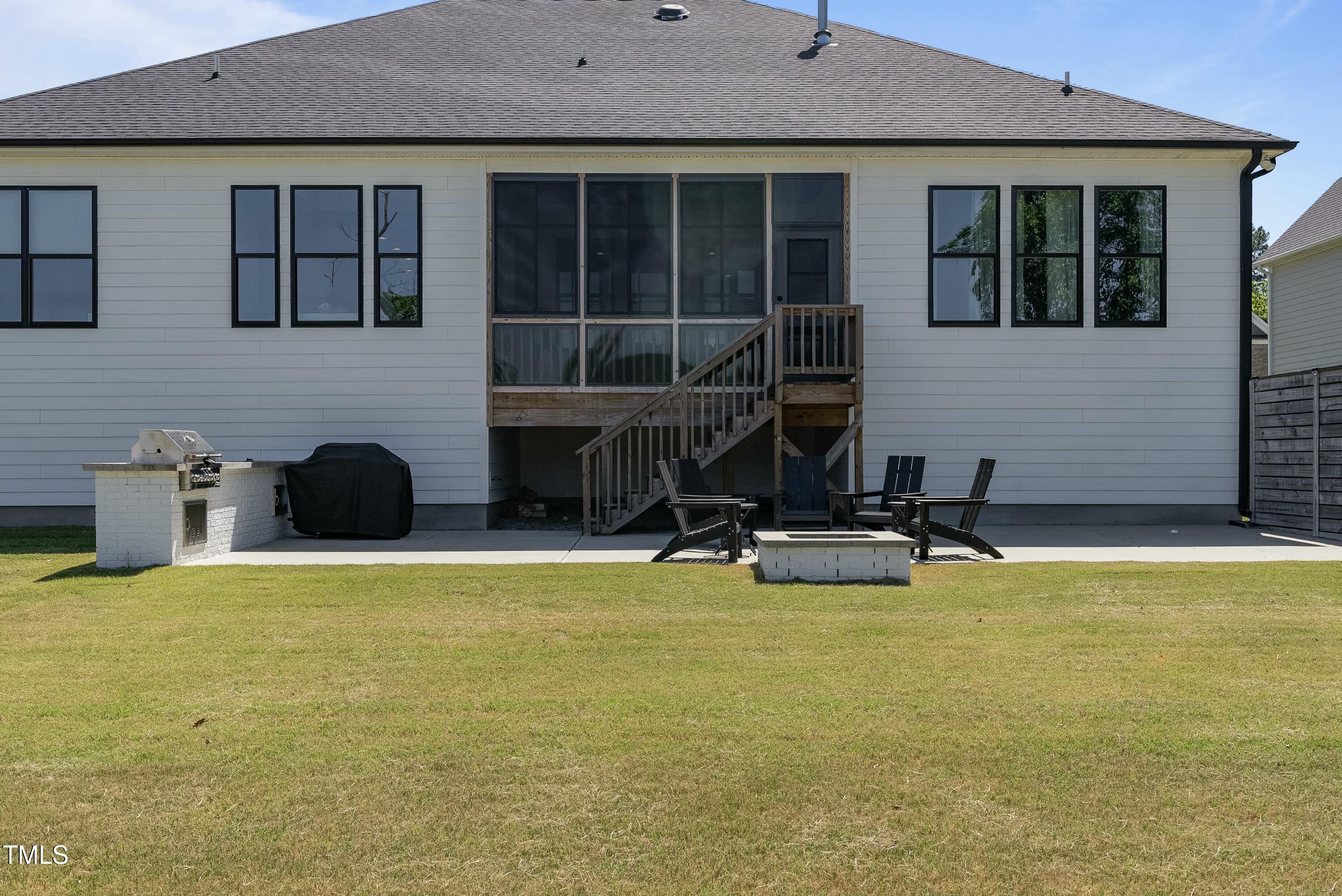 512 Adkins Ridge Road Rolesville, NC 27571 - Photo 11 of 53 a view of a house with swimming pool and sitting area