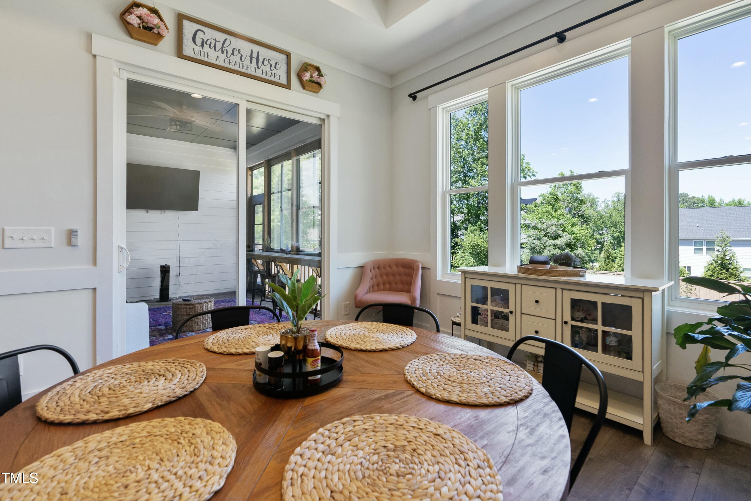 512 Adkins Ridge Road Rolesville, NC 27571 - Photo 23 of 53 a view of a livingroom with furniture and windows