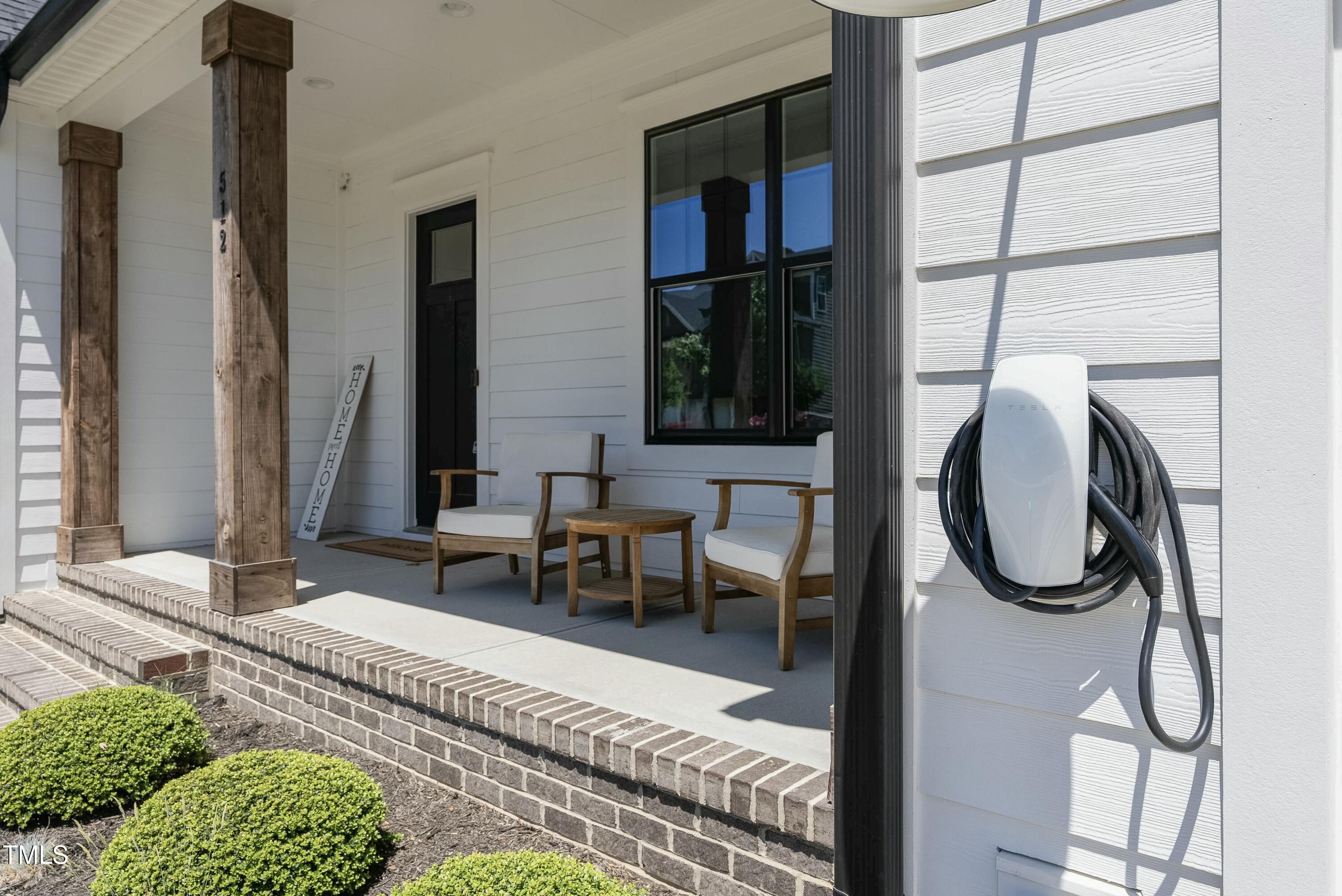 512 Adkins Ridge Road Rolesville, NC 27571 - Photo 3 of 53 a living room with furniture a rug and a window