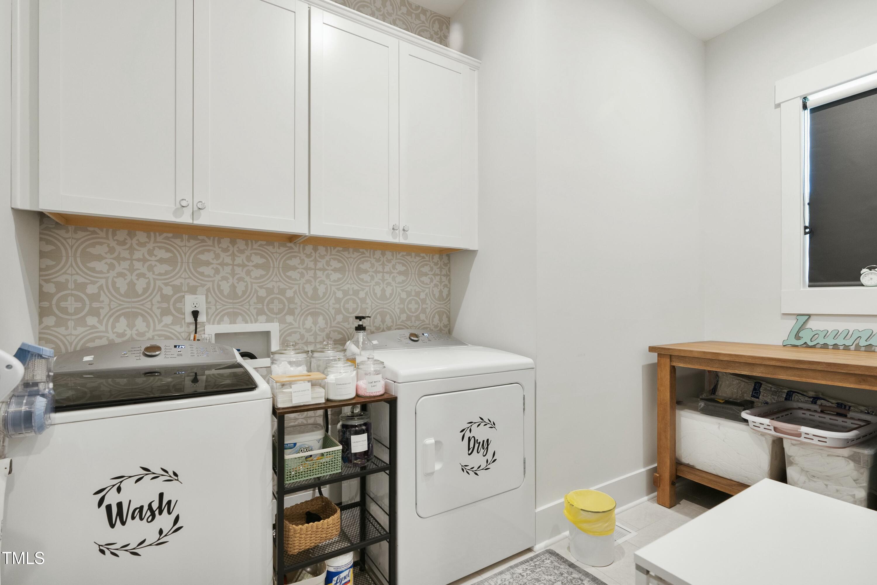 512 Adkins Ridge Road Rolesville, NC 27571 - Photo 45 of 53 a utility room with sink dryer and washer