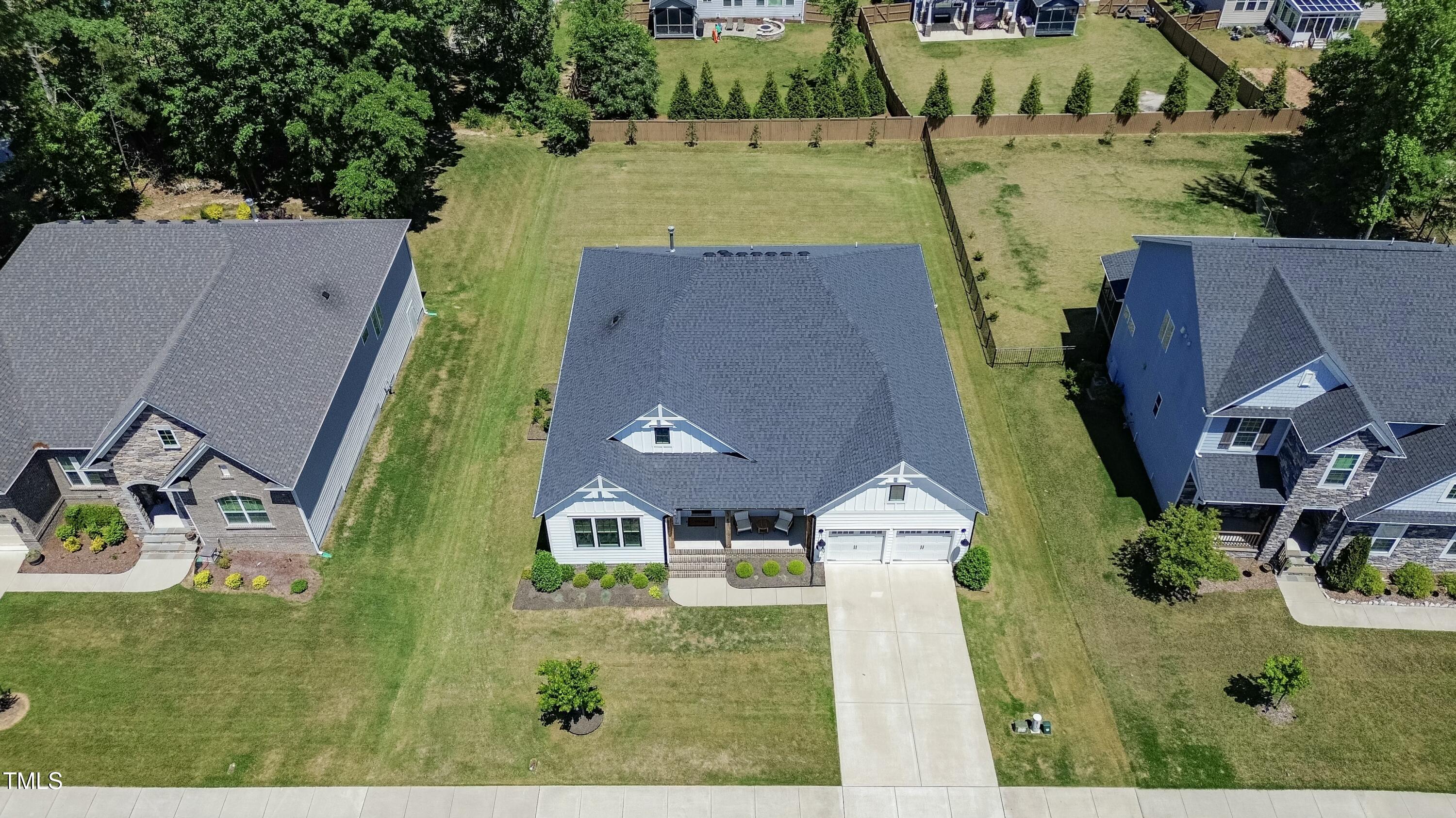 512 Adkins Ridge Road Rolesville, NC 27571 - Photo 50 of 53 an aerial view of a house with a yard