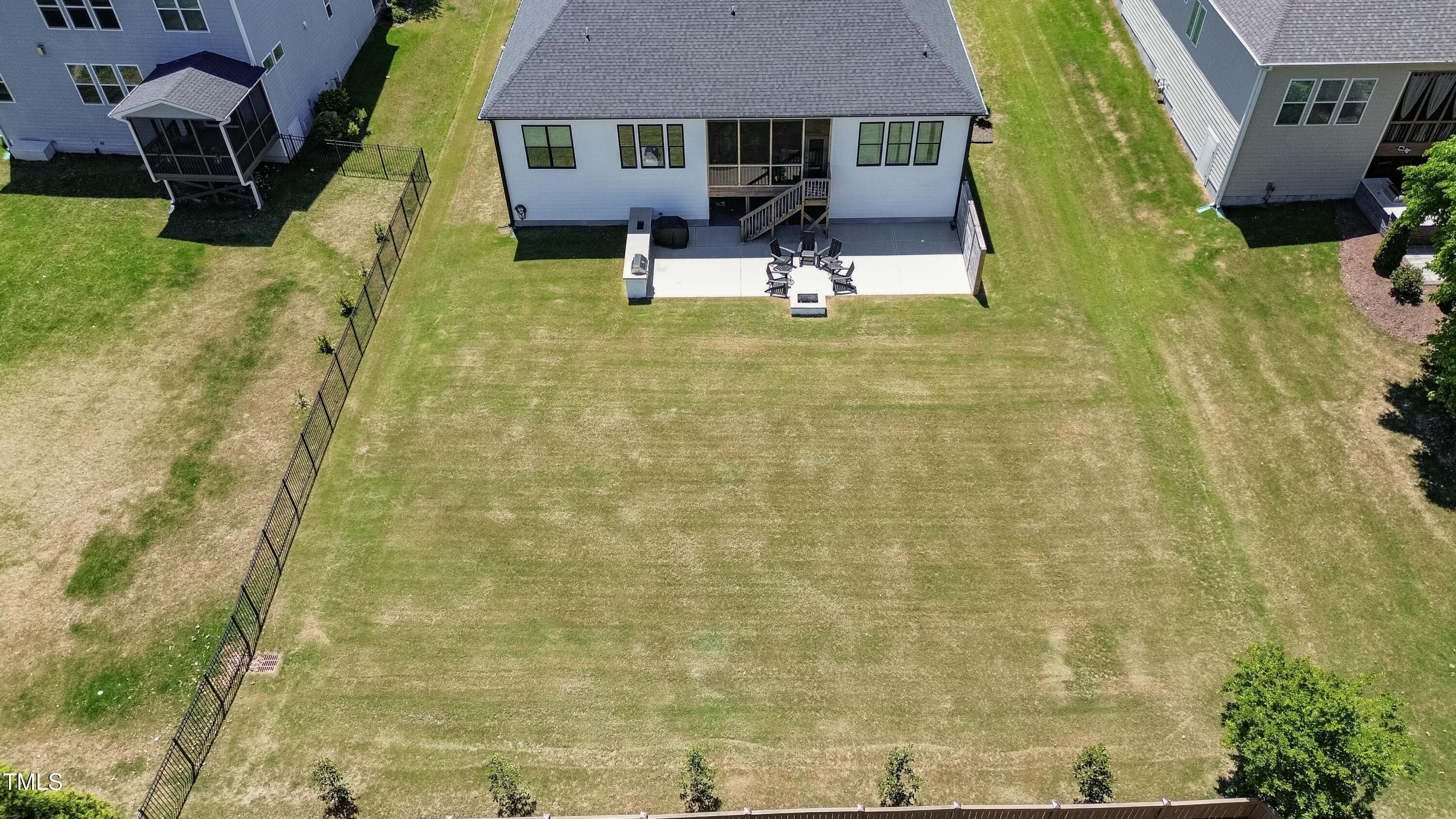 512 Adkins Ridge Road Rolesville, NC 27571 - Photo 52 of 53 a house view with swimming pool in front of it